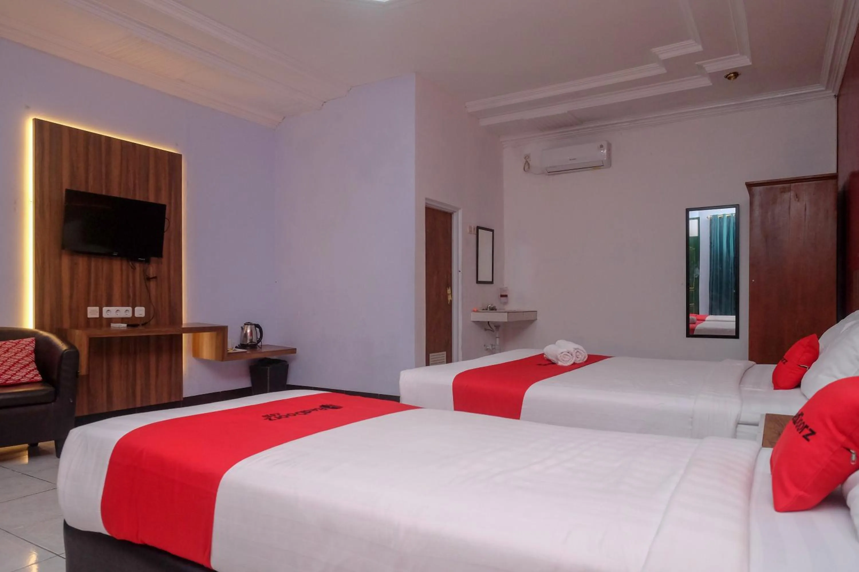 Bed in RedDoorz At Pondok Eyang Obi Sleman