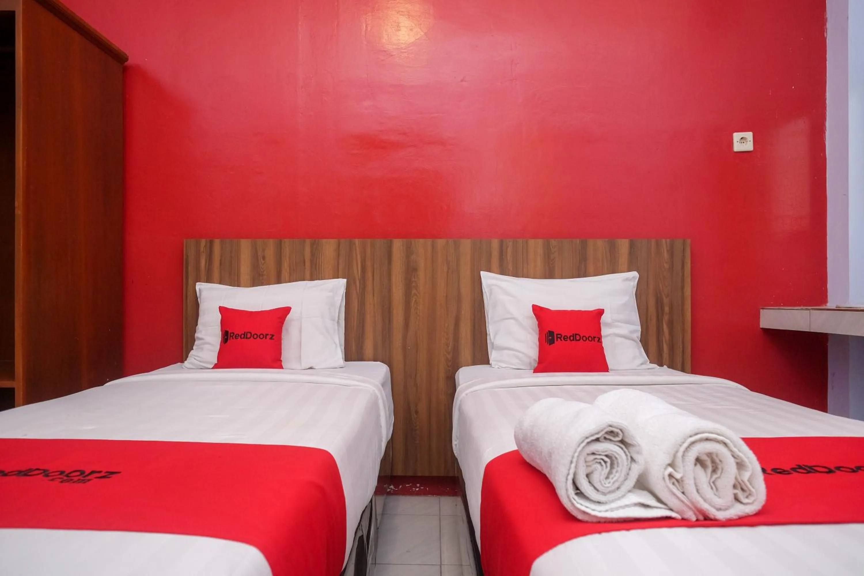 Bed in RedDoorz At Pondok Eyang Obi Sleman
