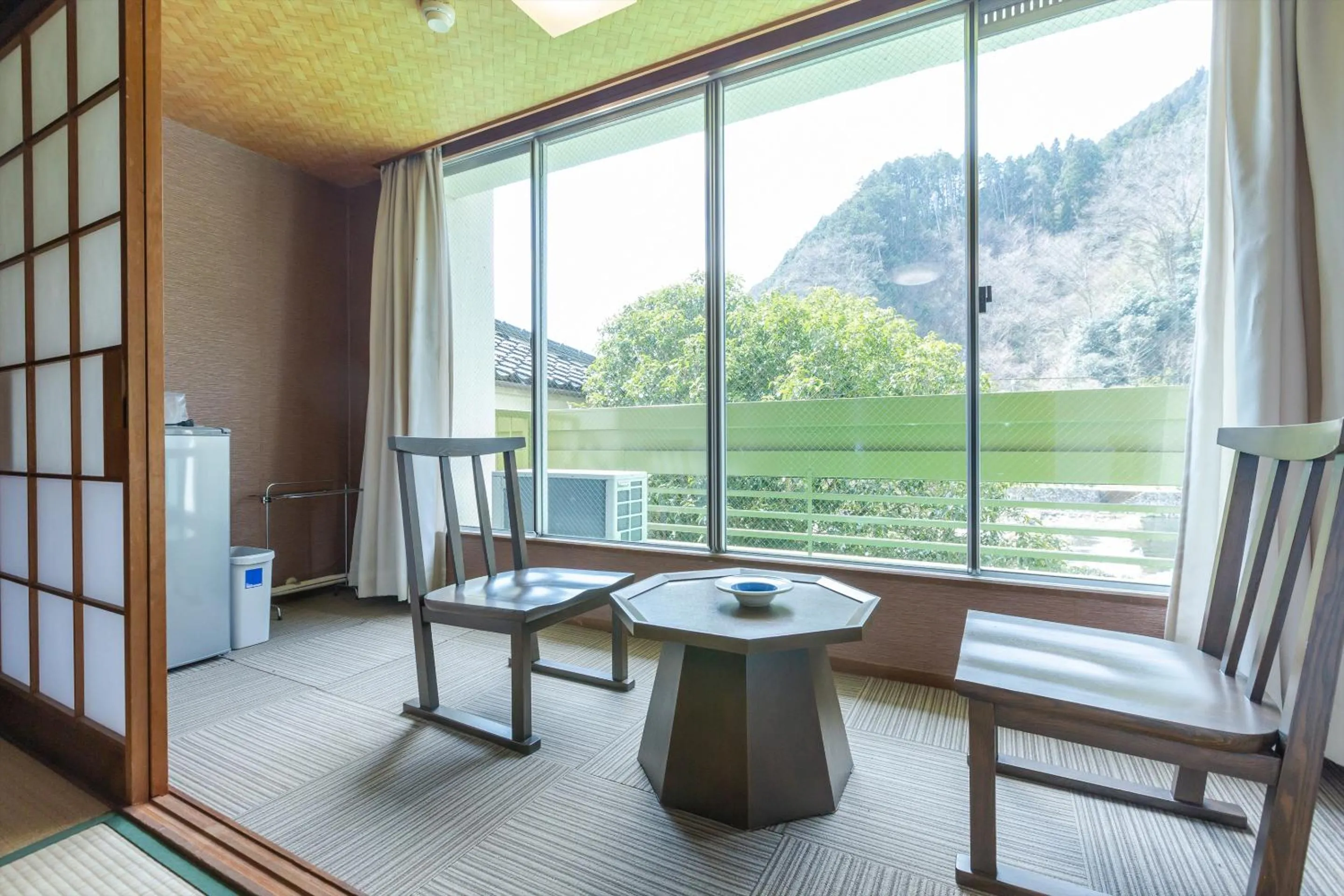 Seating area in Tabist Spa Yubara Okayama Yubaraonsen