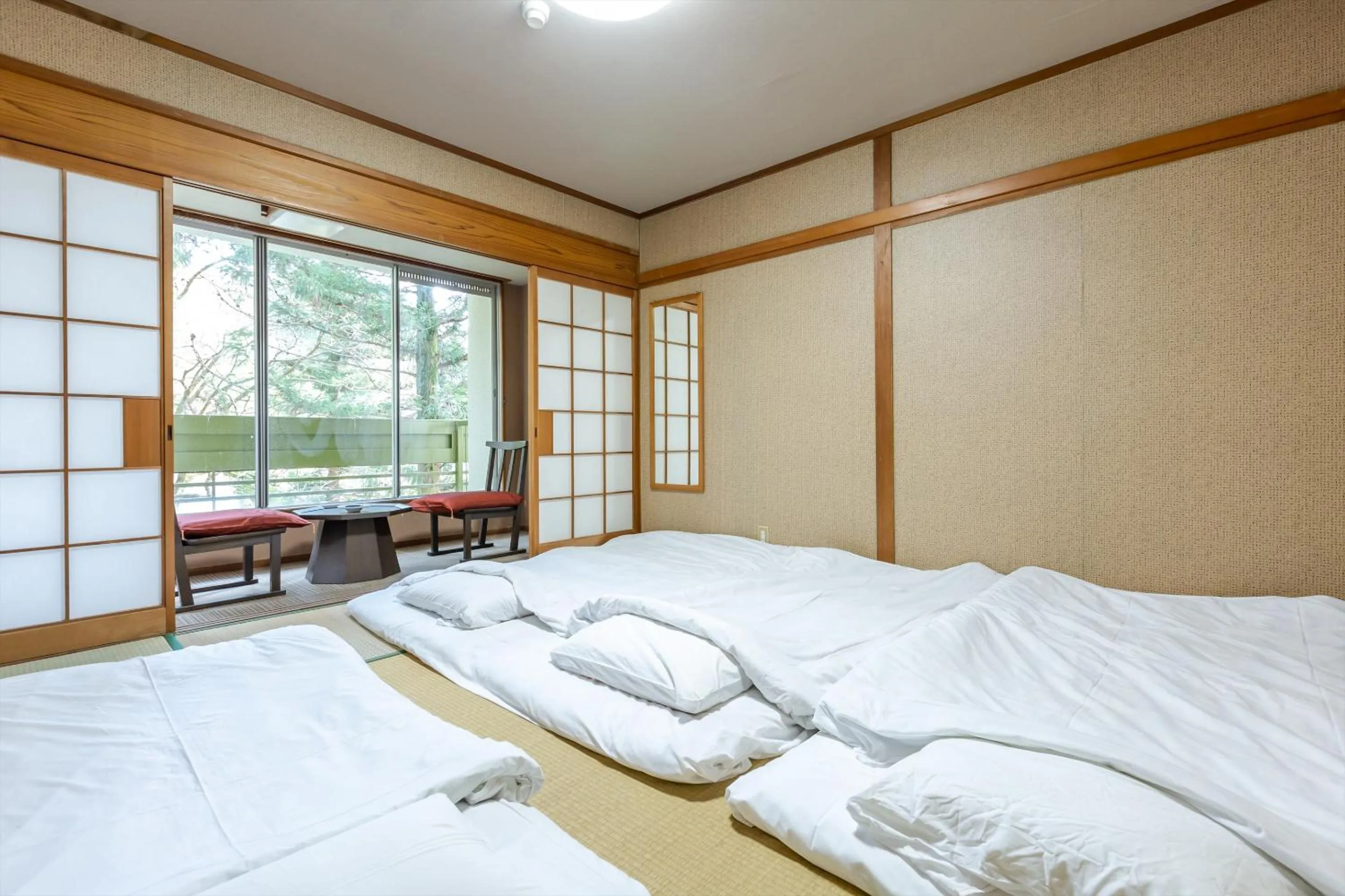 Bed in Tabist Spa Yubara Okayama Yubaraonsen