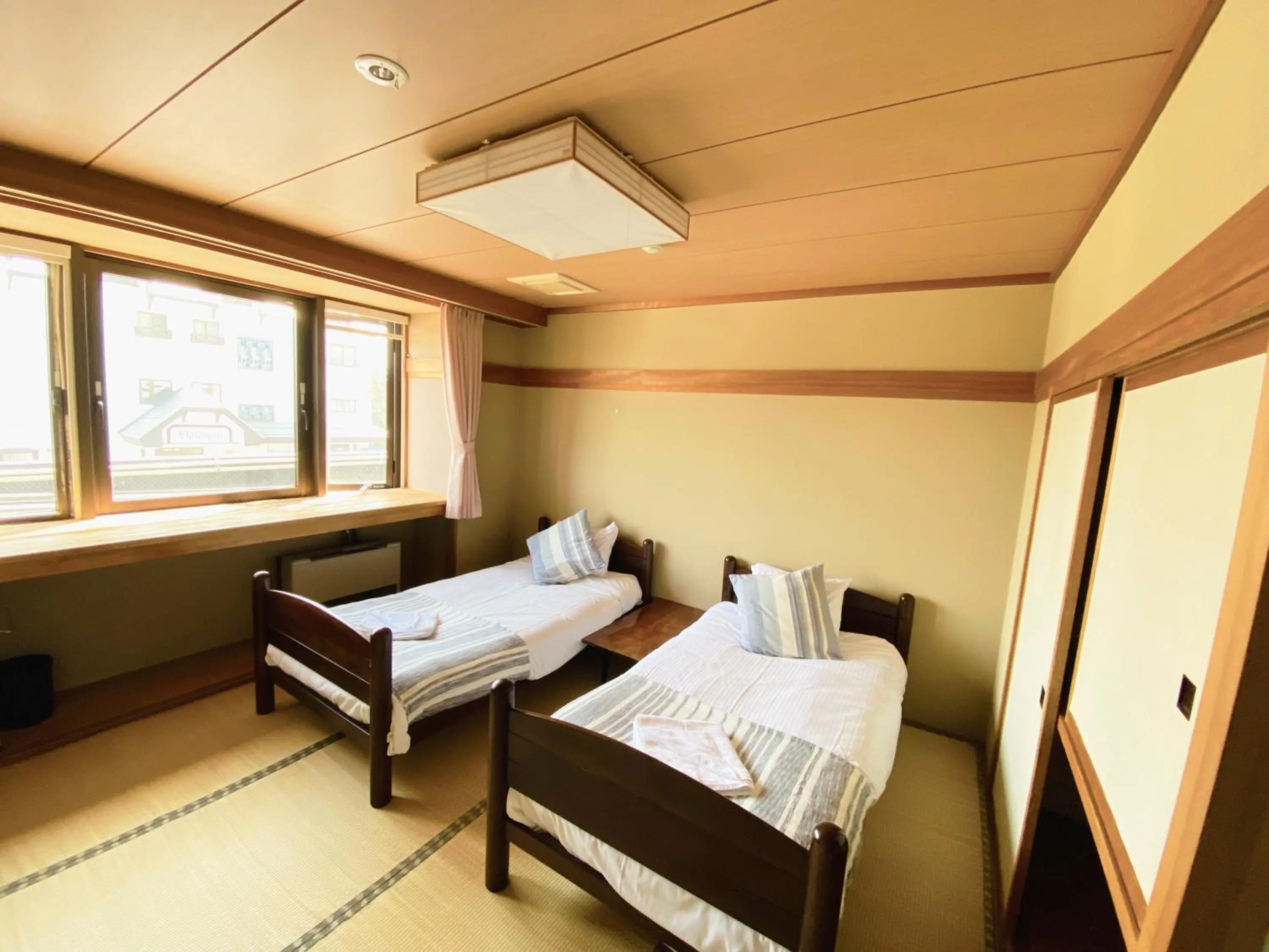 Photo of the whole room, Bed in Red Fox Lodge Myoko
