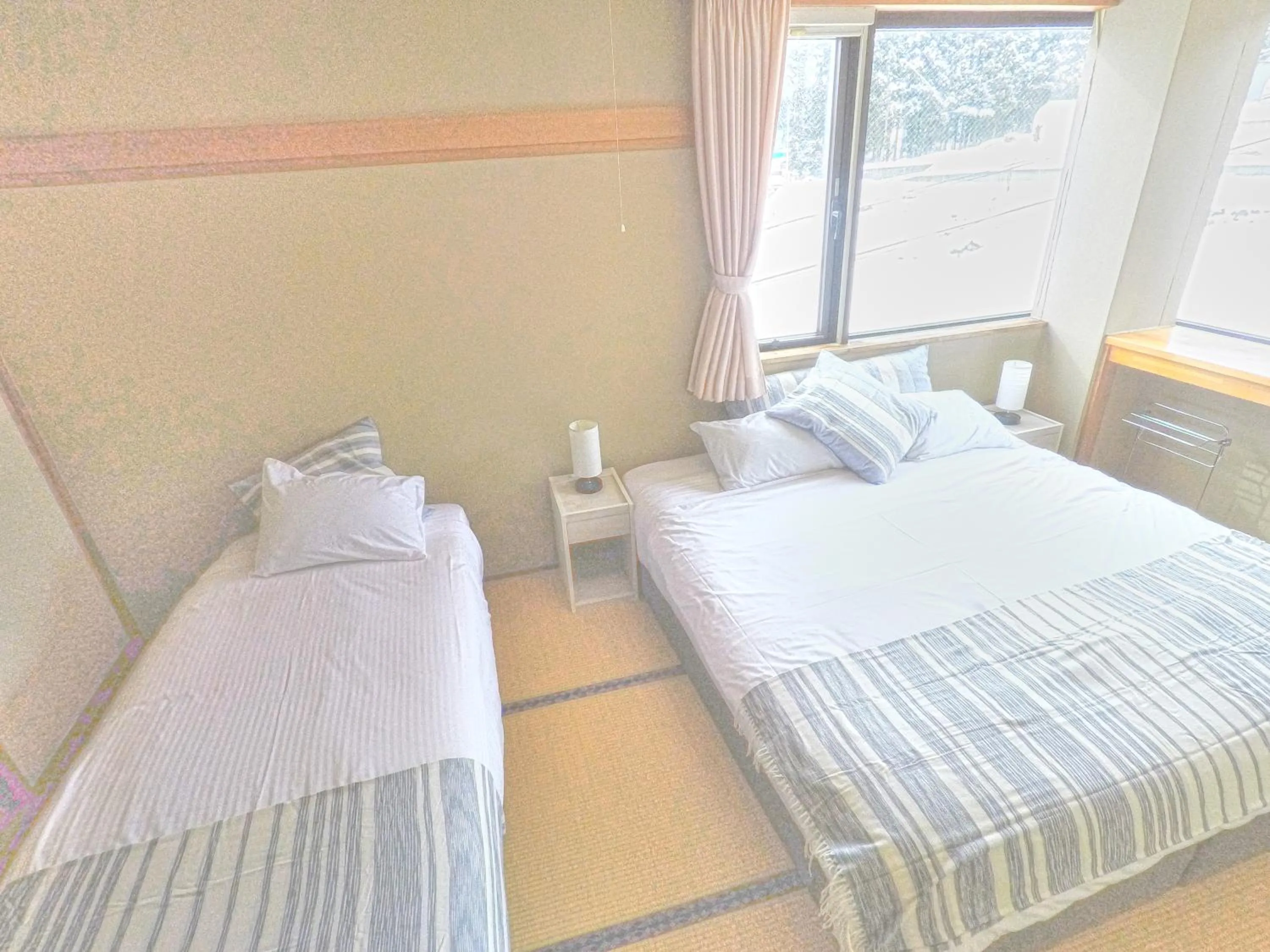 Bed in Red Fox Lodge Myoko