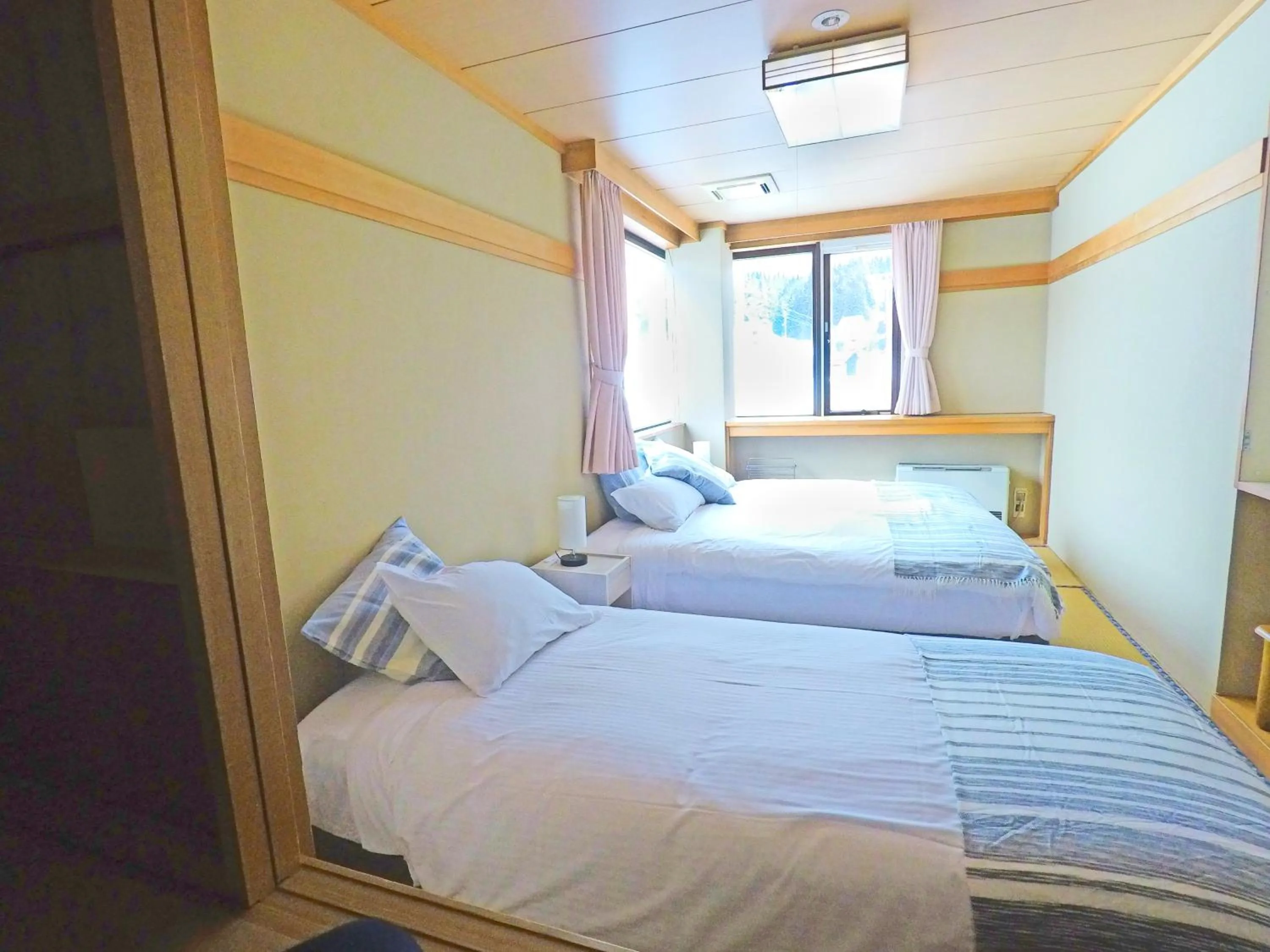 Bed in Red Fox Lodge Myoko