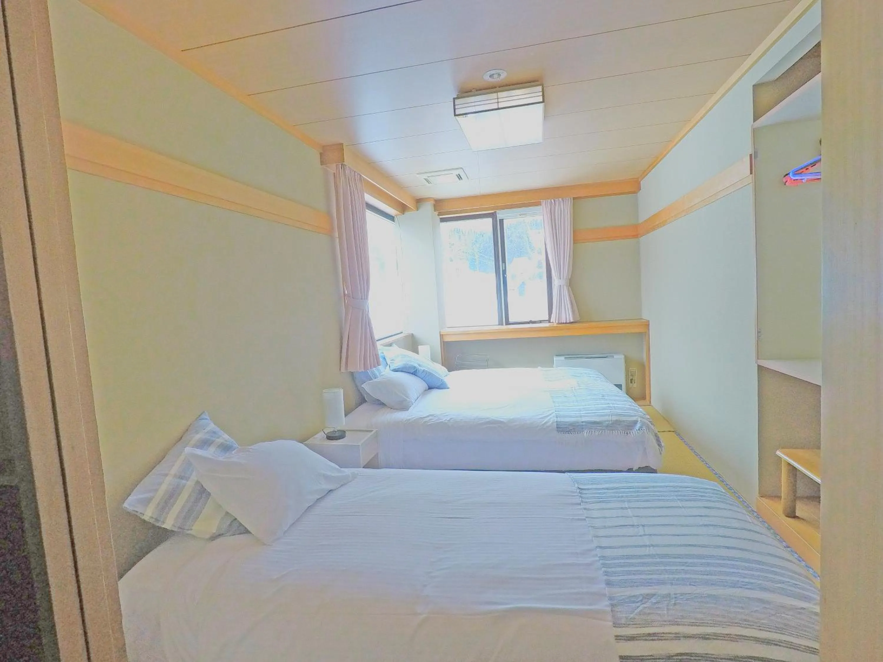 Bed in Red Fox Lodge Myoko