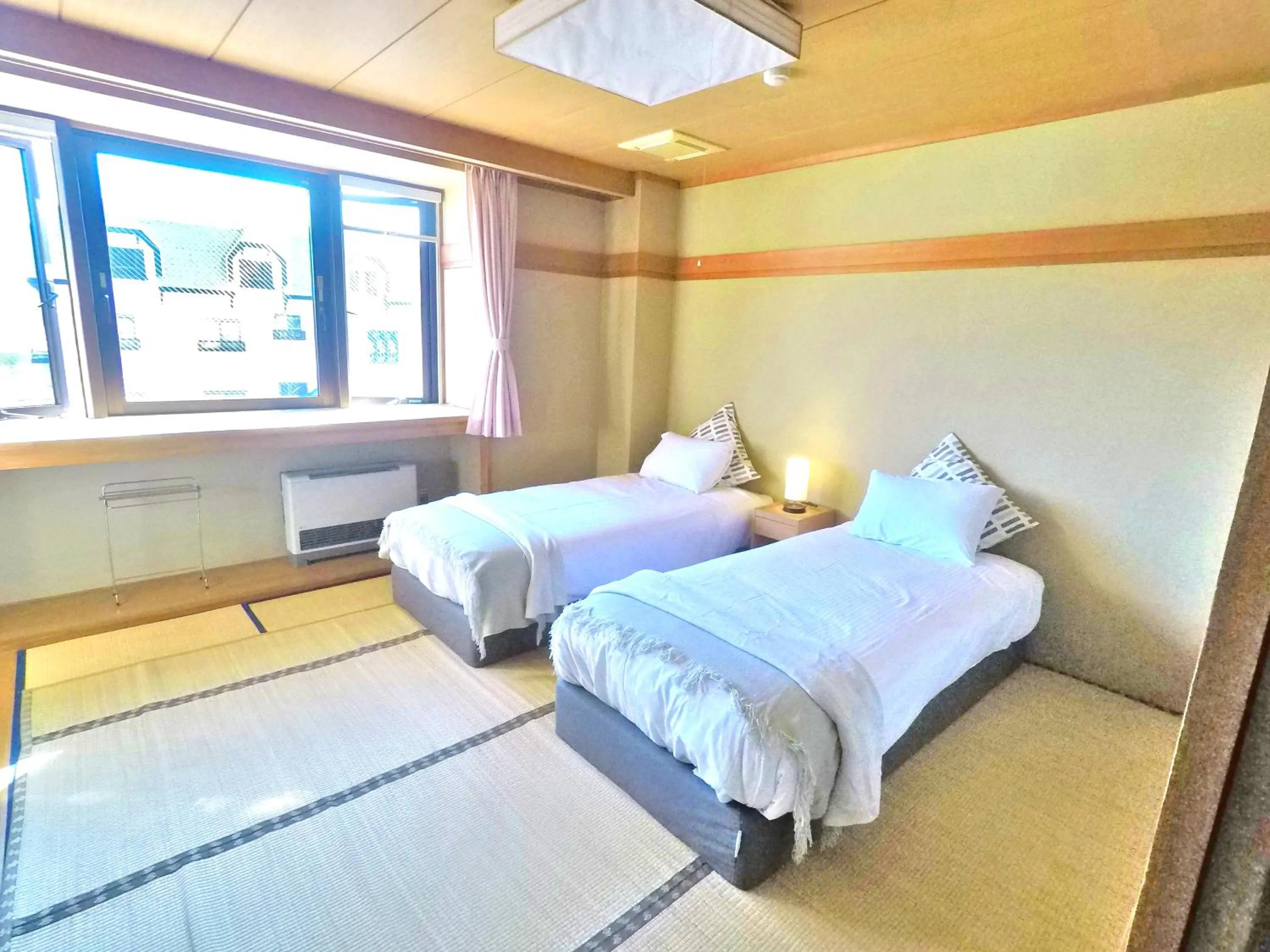 Bed in Red Fox Lodge Myoko