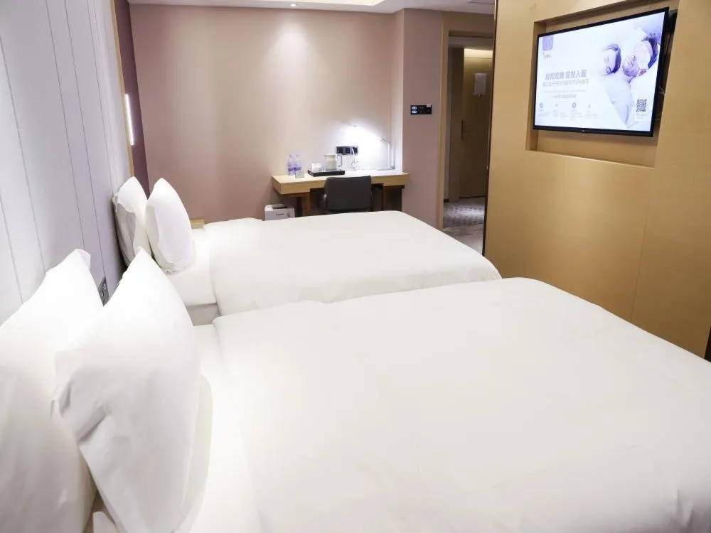 Bed in LAVANDE HOTELS SHENZHEN NORTH STATION LONGHUA FOXCONN HEADQUARTERS