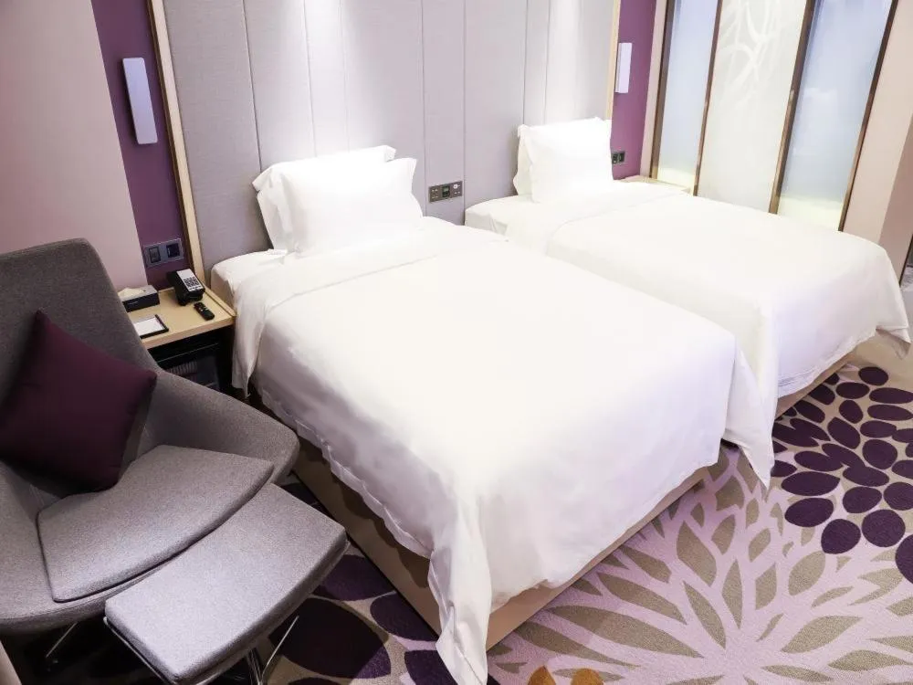 Bed in LAVANDE HOTELS SHENZHEN NORTH STATION LONGHUA FOXCONN HEADQUARTERS