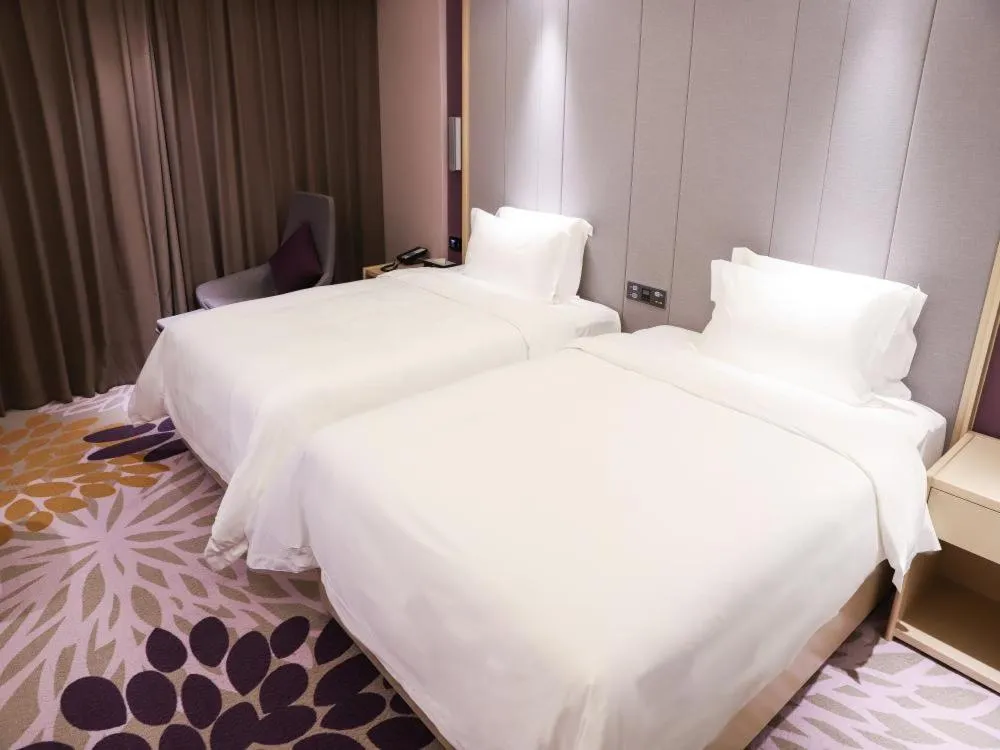 Bed in LAVANDE HOTELS SHENZHEN NORTH STATION LONGHUA FOXCONN HEADQUARTERS