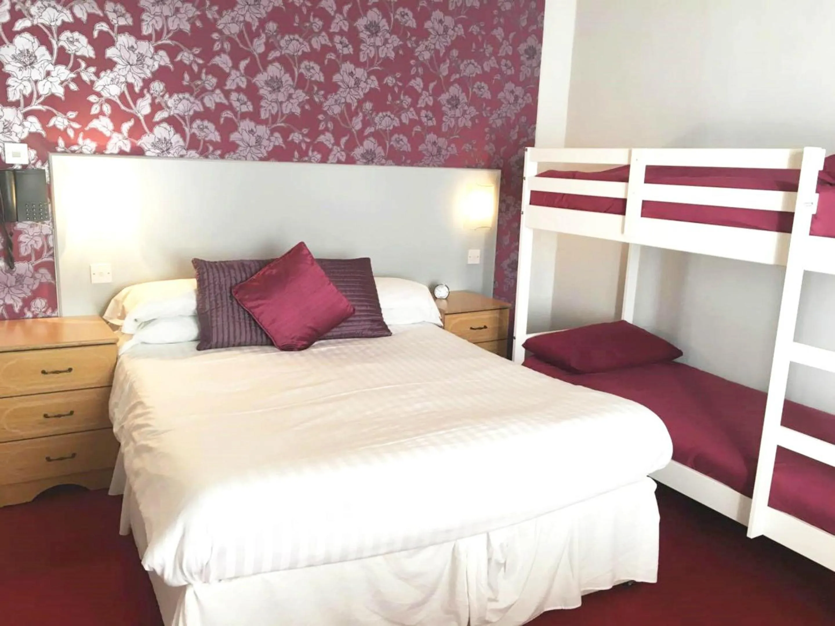 Bedroom in Harrow Lodge Hotel