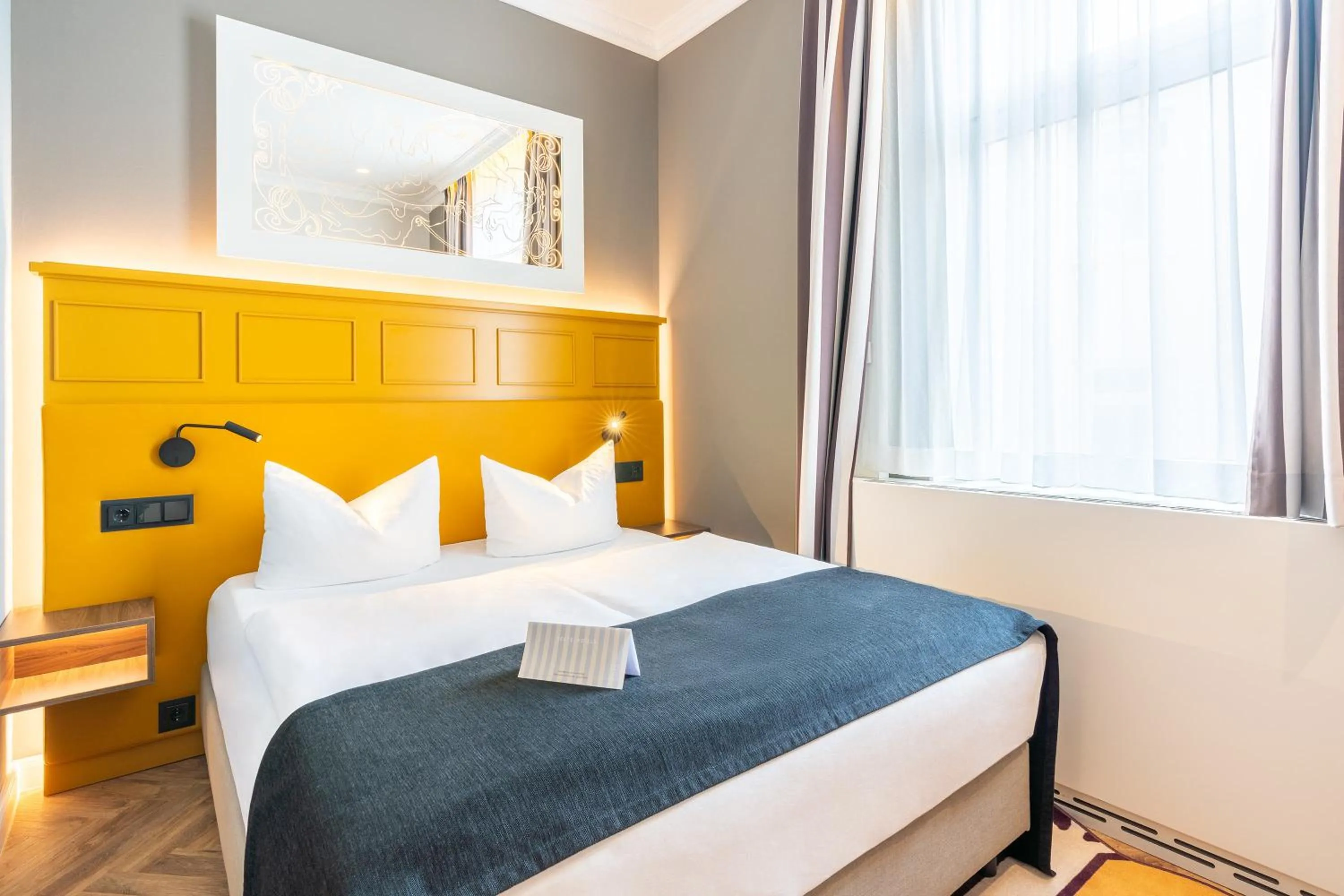 Photo of the whole room, Bed in SEETELHOTEL Ostseehotel das Entdeckerhotel an der Ostsee und der perfekte Startpunkt für Ihre Inselabenteuer