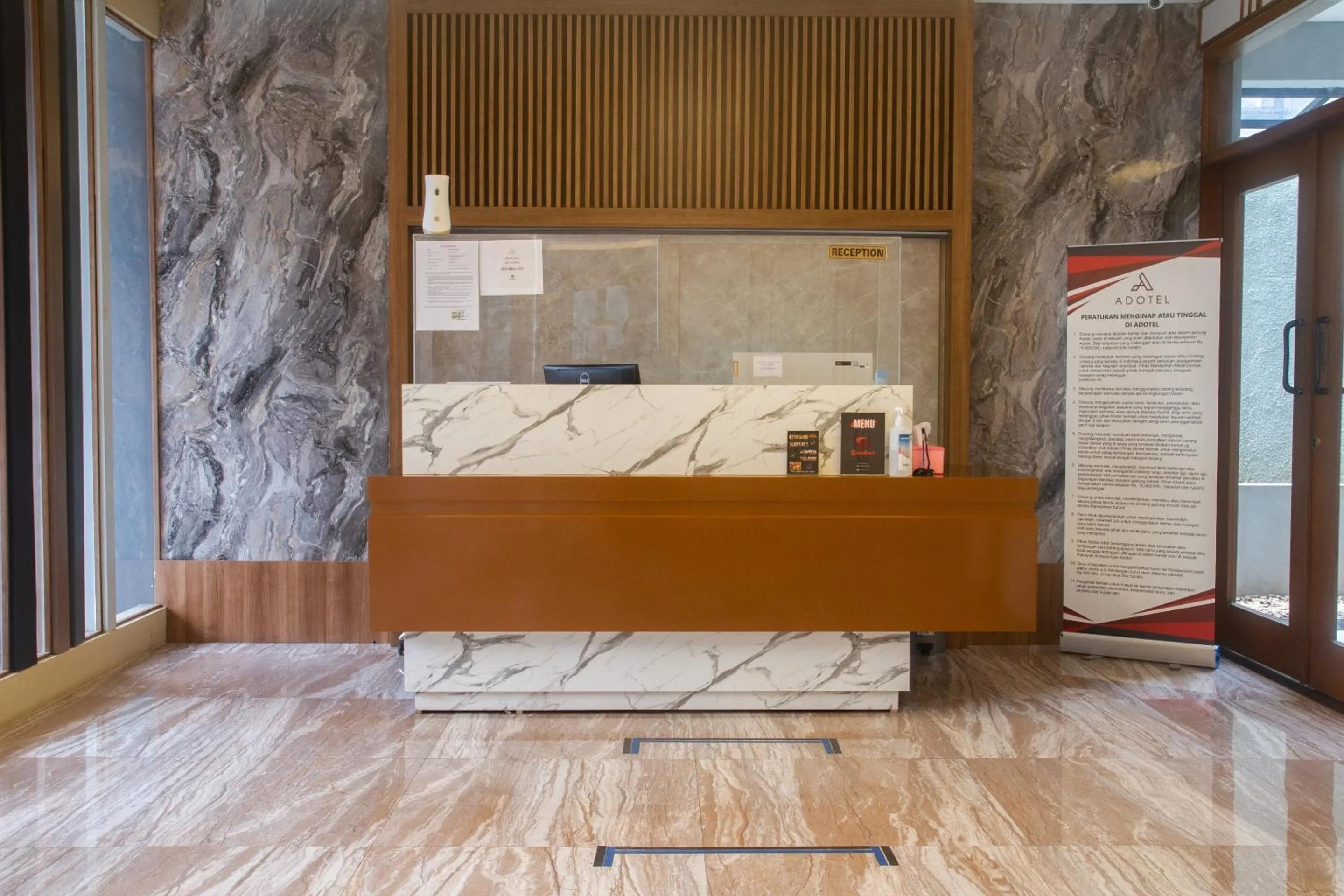 Lobby or reception in Adotel