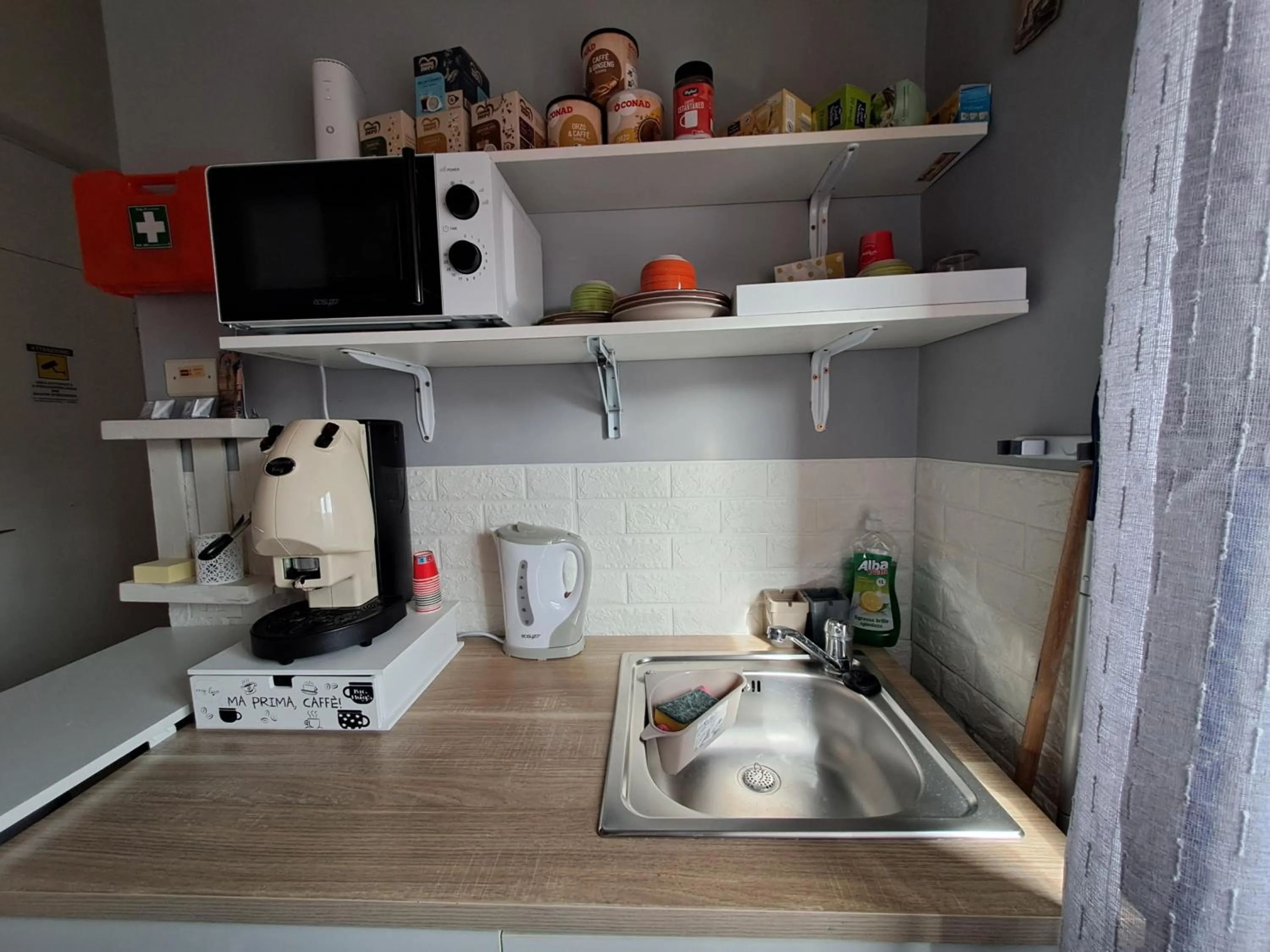 Kitchen or kitchenette in Bedroom la stazione