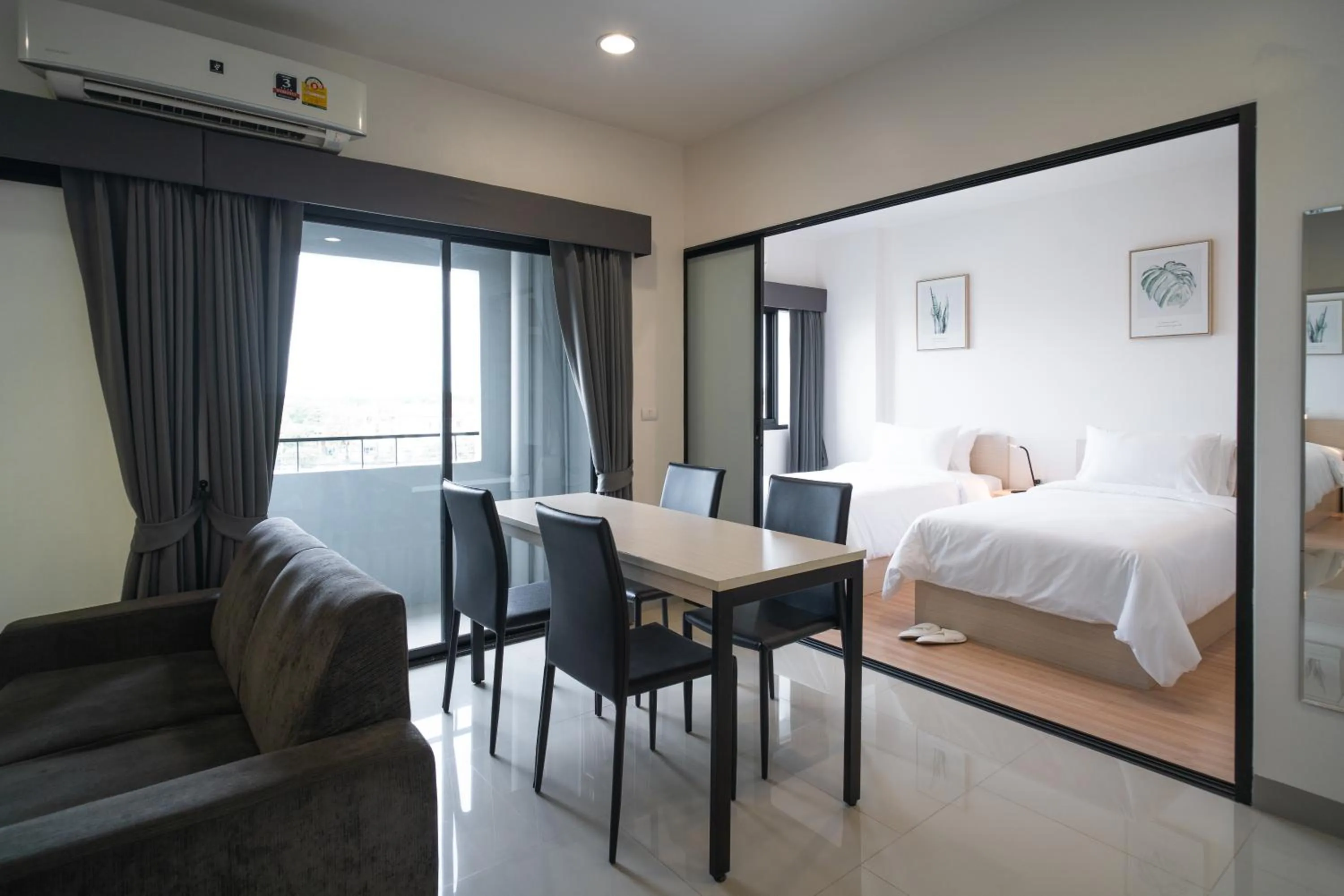 Photo of the whole room, Bed in KOS Hotel Suvarnabhumi Airport -SHA Extra Plus