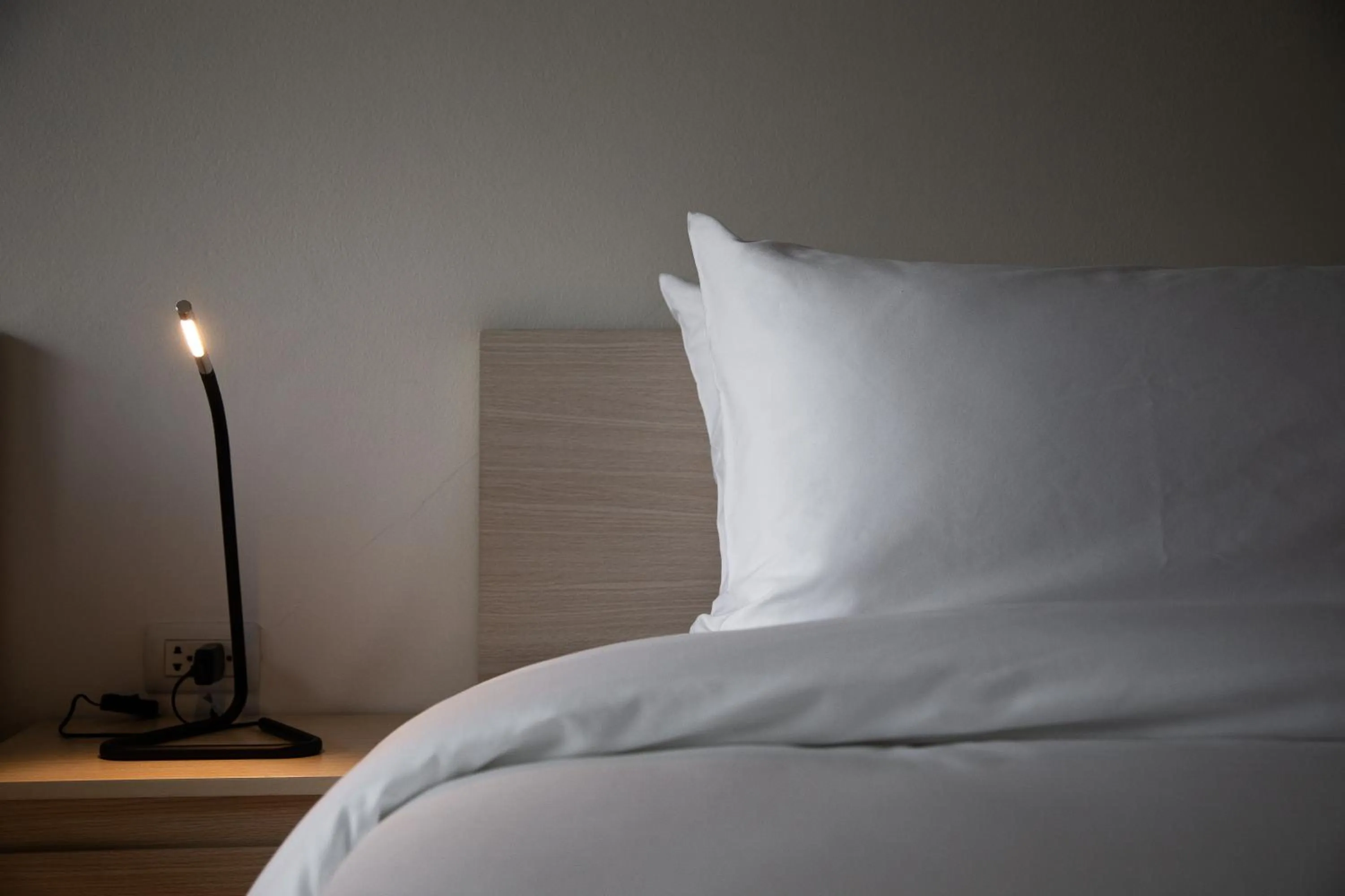 Bed in KOS Hotel Suvarnabhumi Airport -SHA Extra Plus