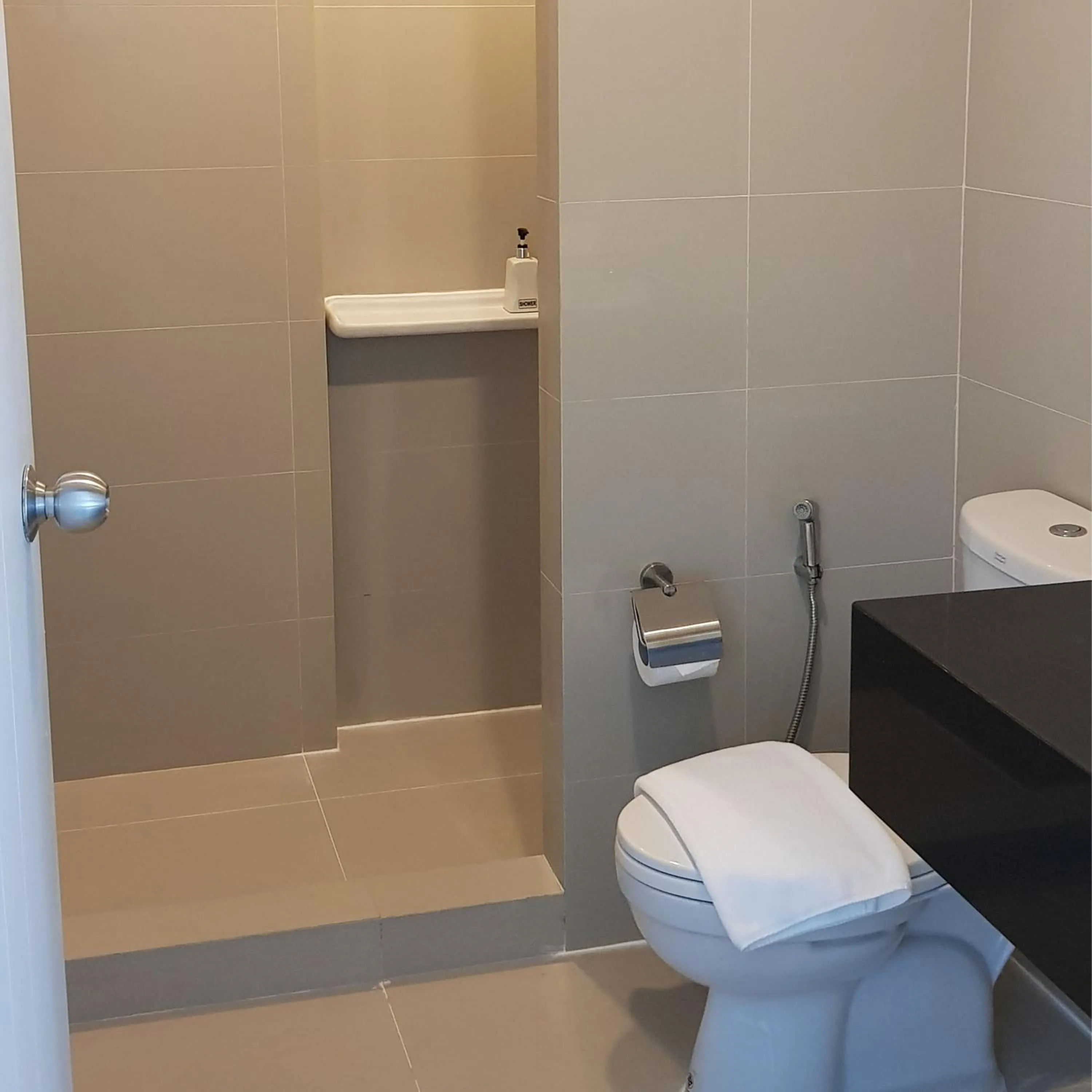 Toilet in KOS Hotel Suvarnabhumi Airport -SHA Extra Plus