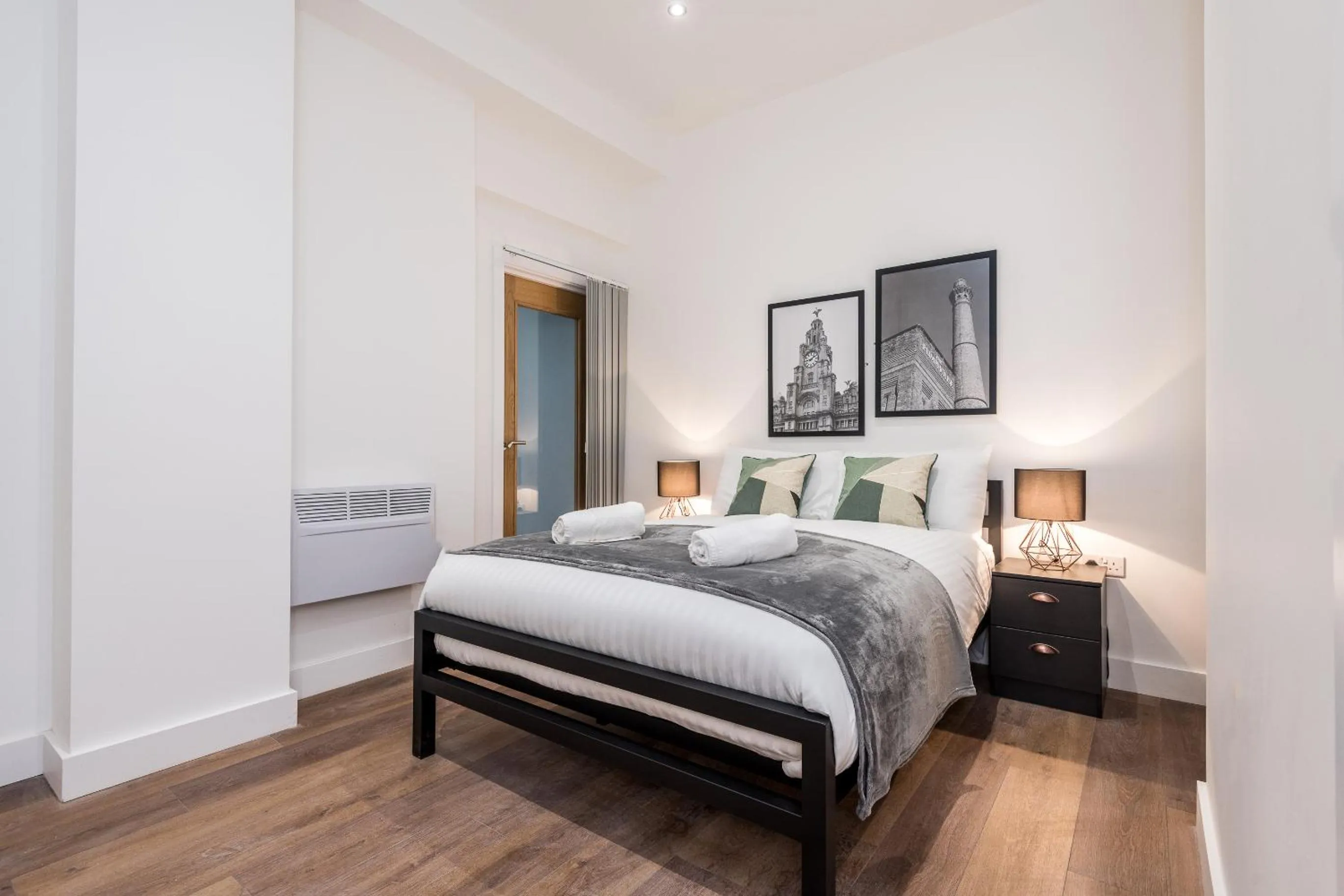 Bed in SGT Peppers Mathew Street Apartments By Happy Days