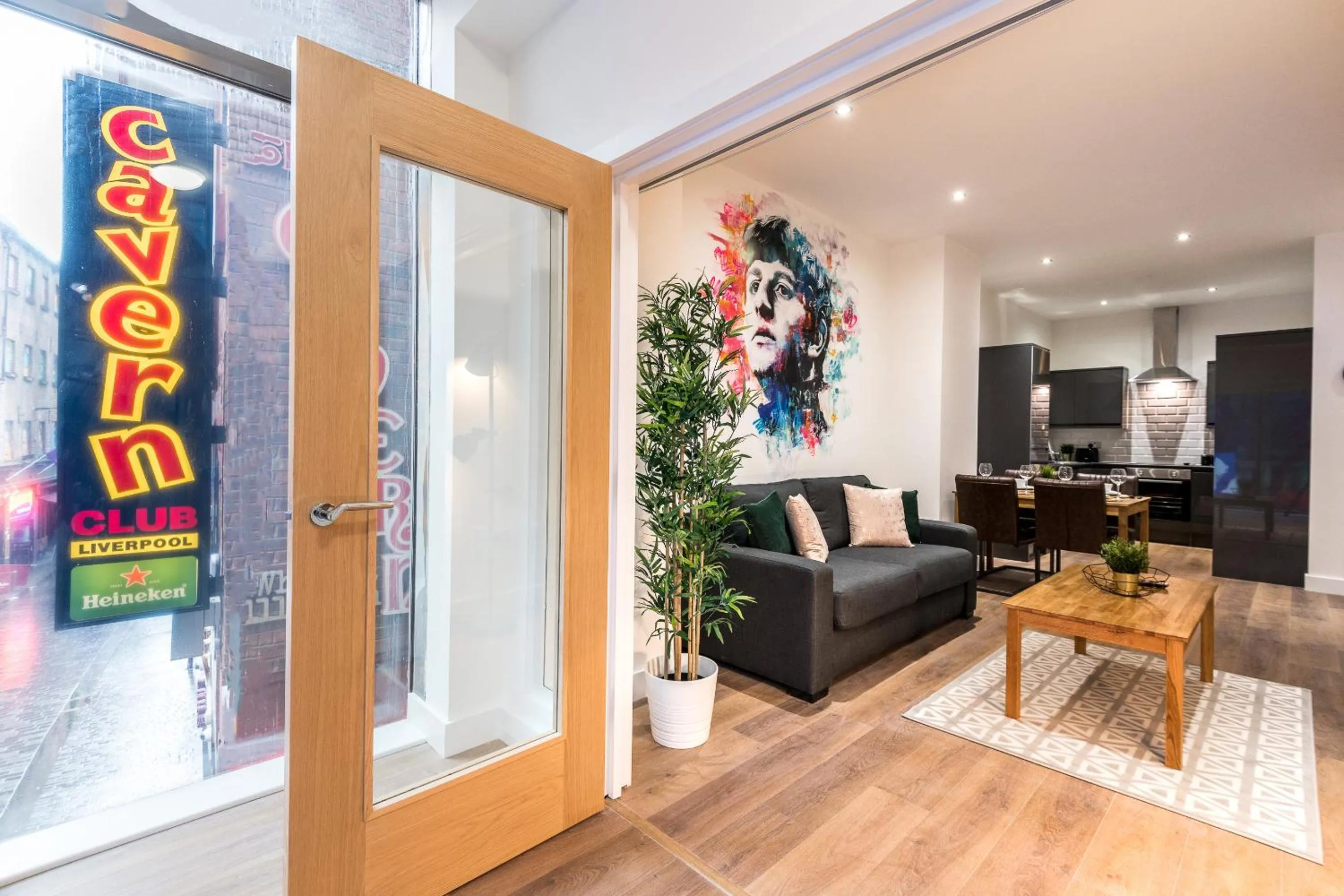 Seating area in SGT Peppers Mathew Street Apartments By Happy Days