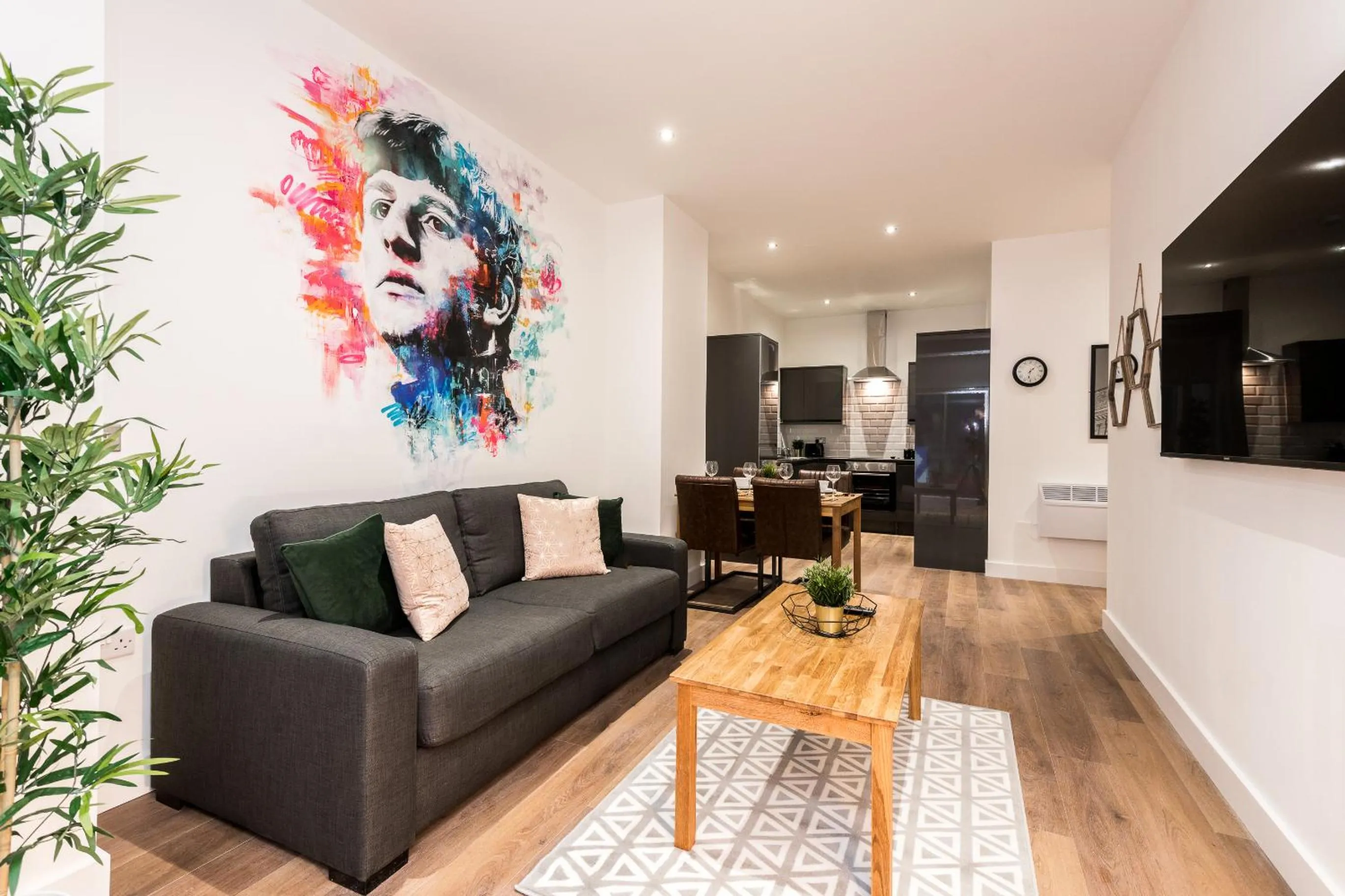 Living room in SGT Peppers Mathew Street Apartments By Happy Days