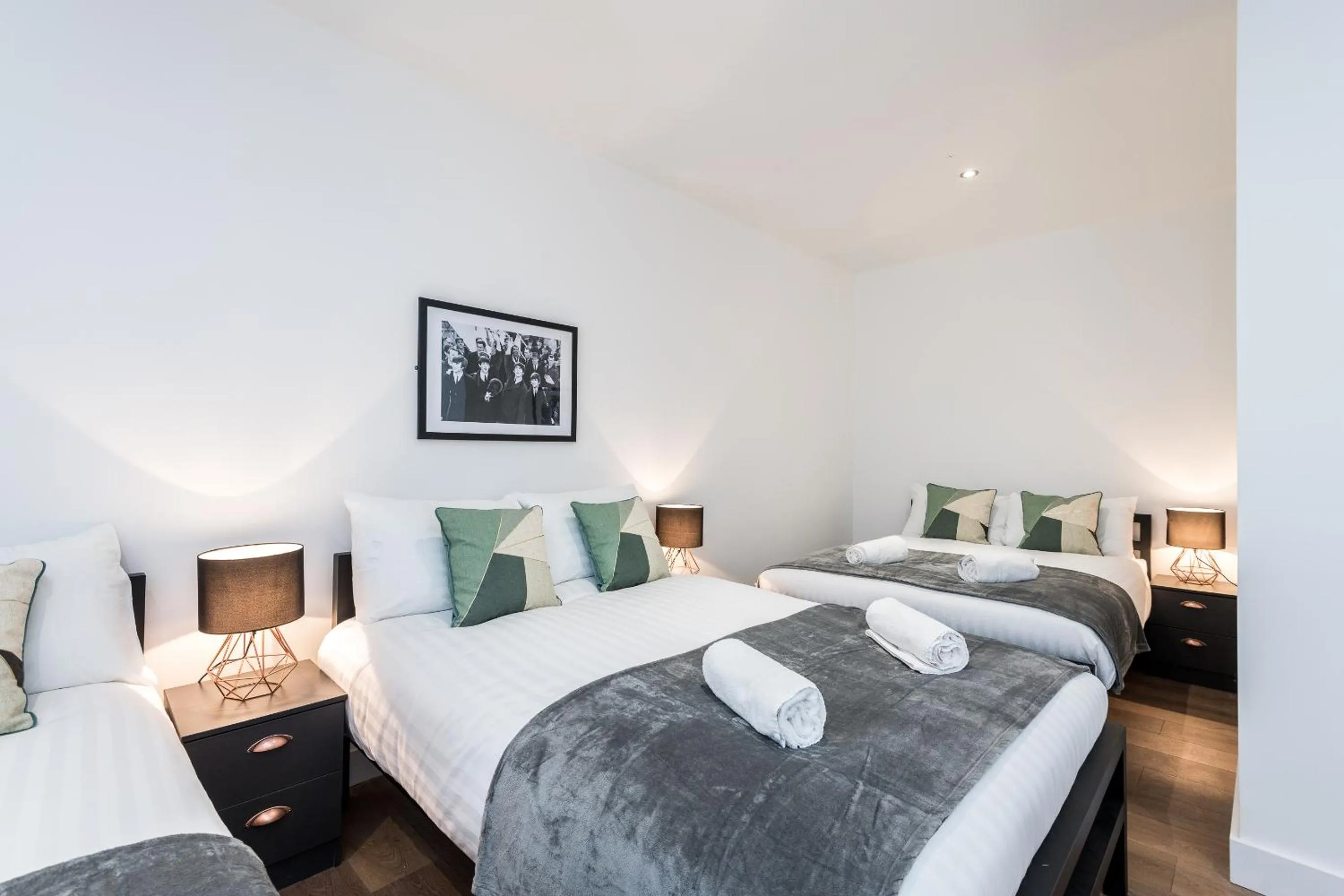 Bed in SGT Peppers Mathew Street Apartments By Happy Days