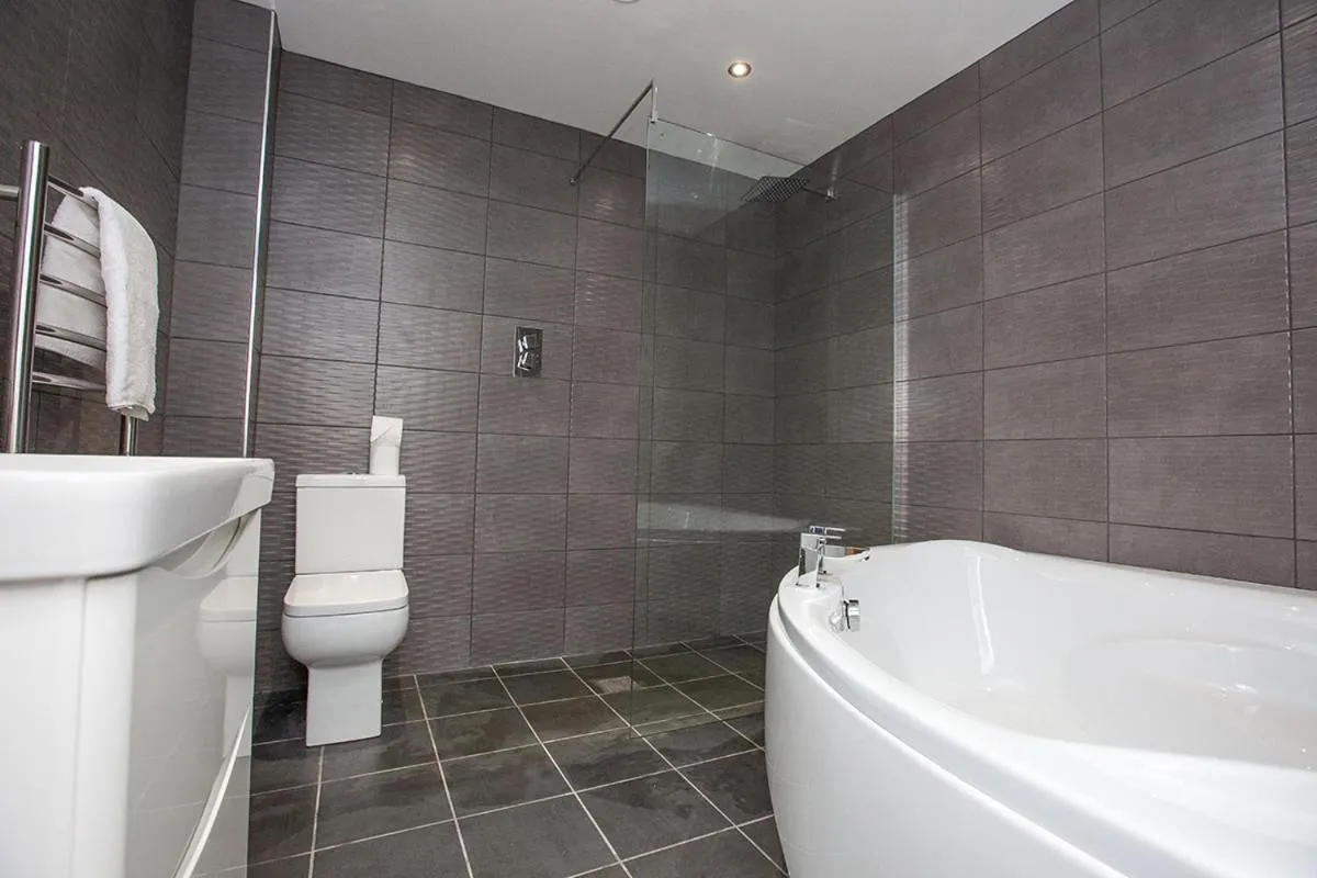 Bathroom in SGT Peppers Mathew Street Apartments By Happy Days