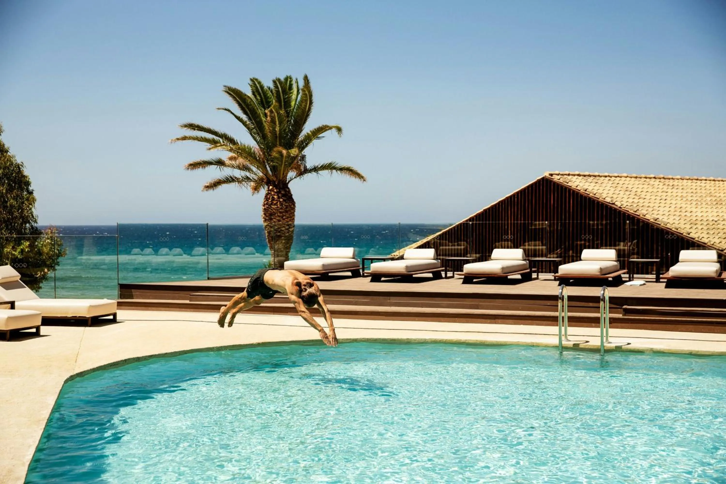 Swimming pool in Domes of Corfu, Autograph Collection