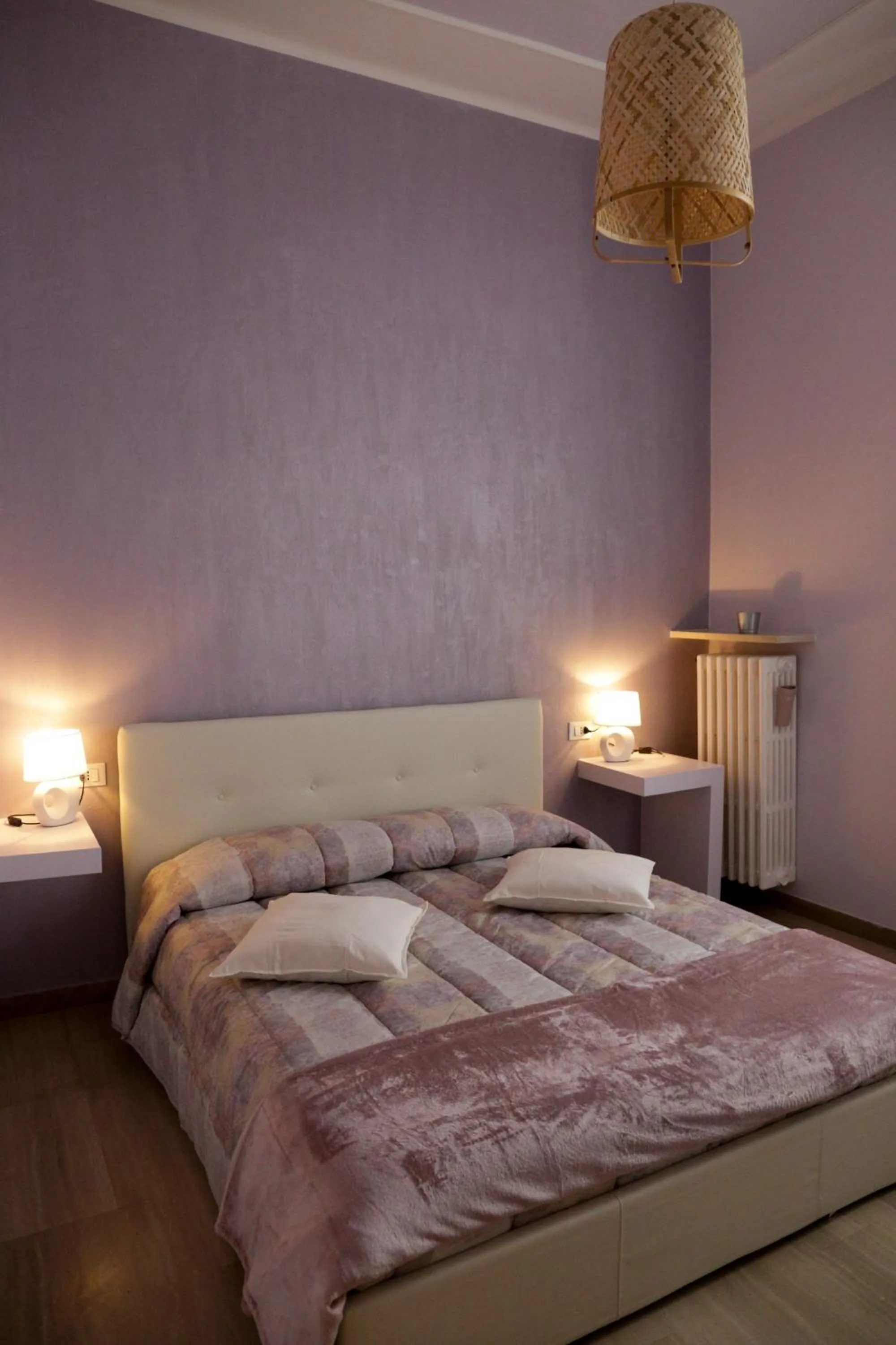 Bed in Ad Astra Rooms