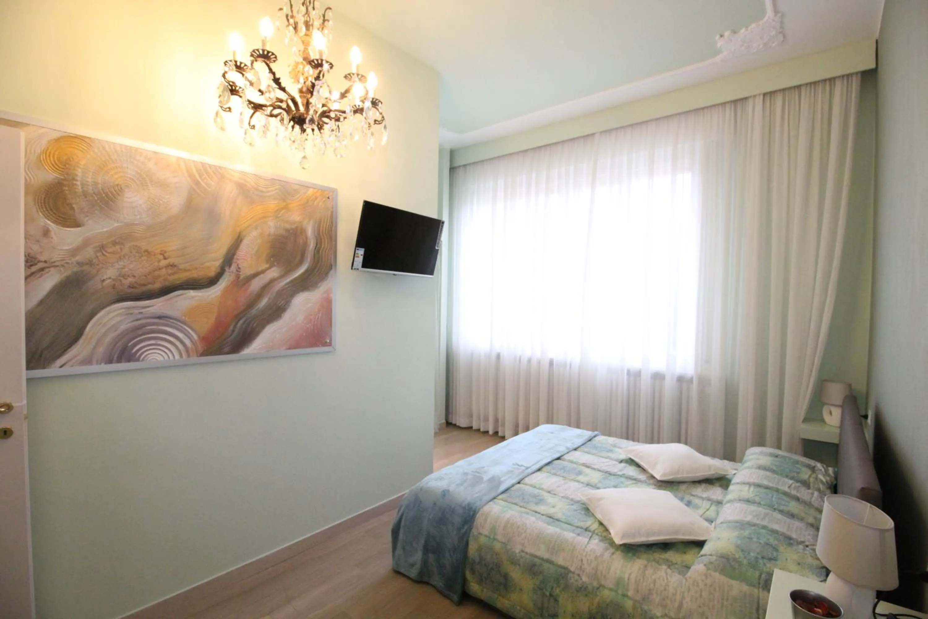 Bed in Ad Astra Rooms