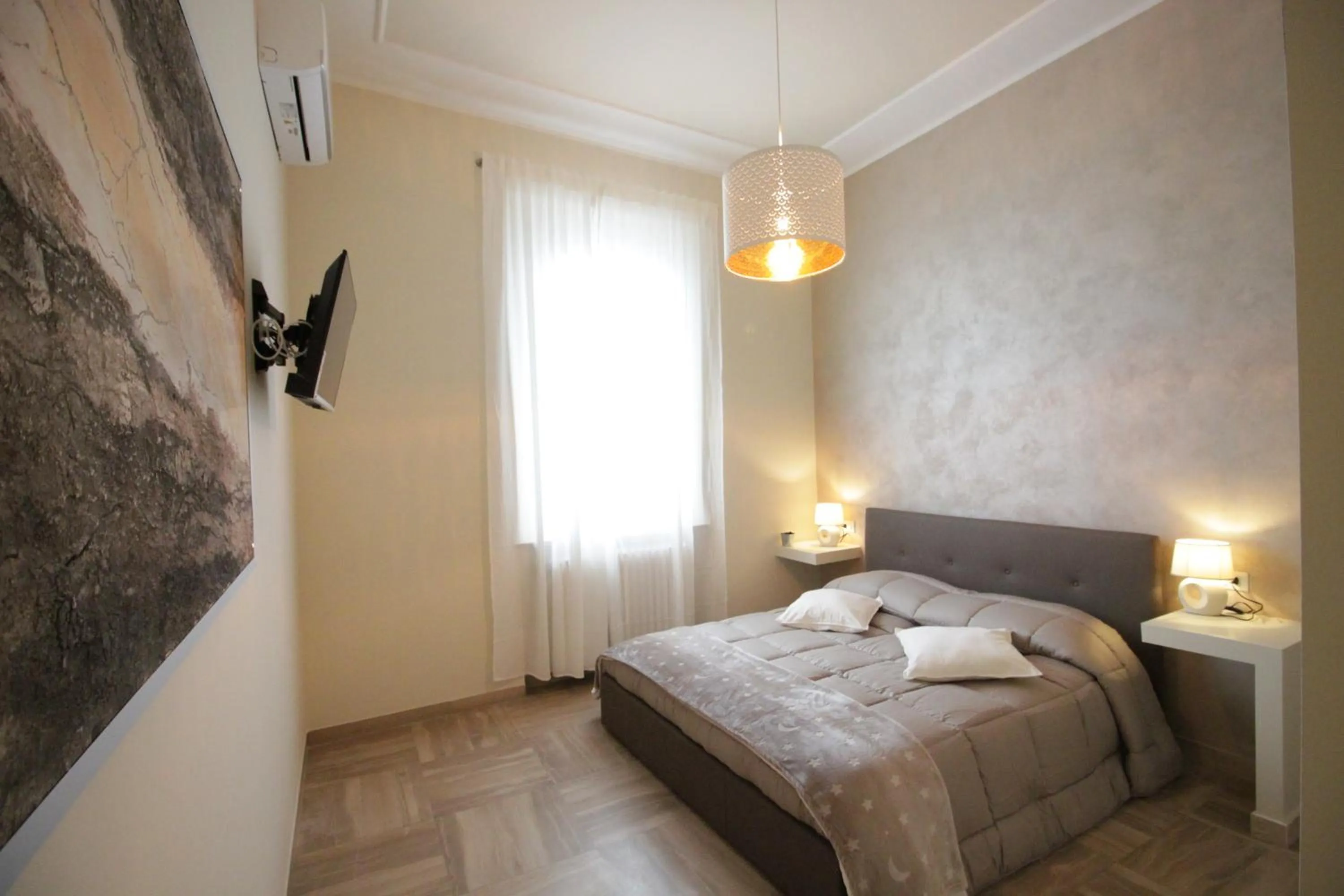 Bed in Ad Astra Rooms