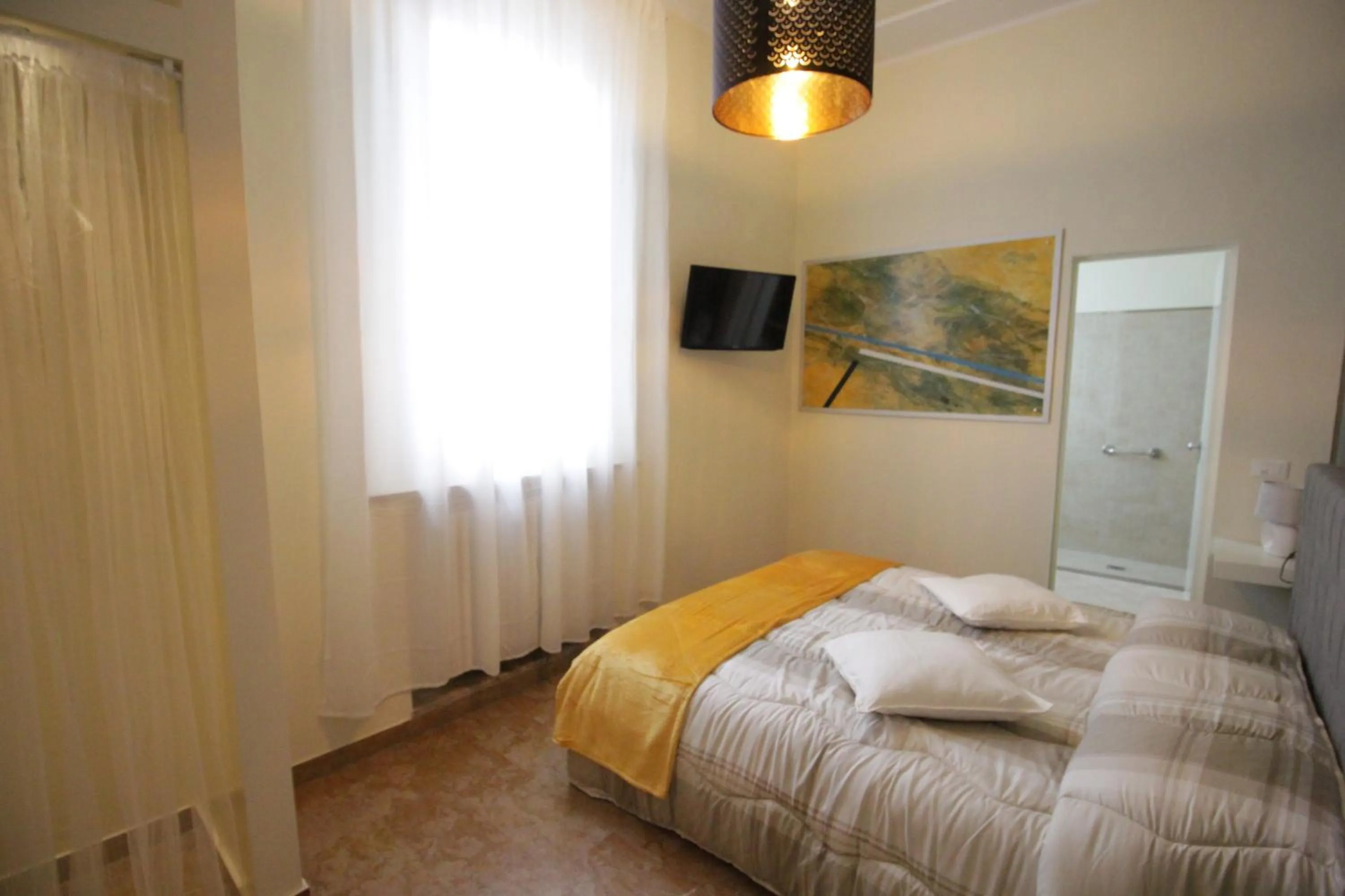 Bed in Ad Astra Rooms