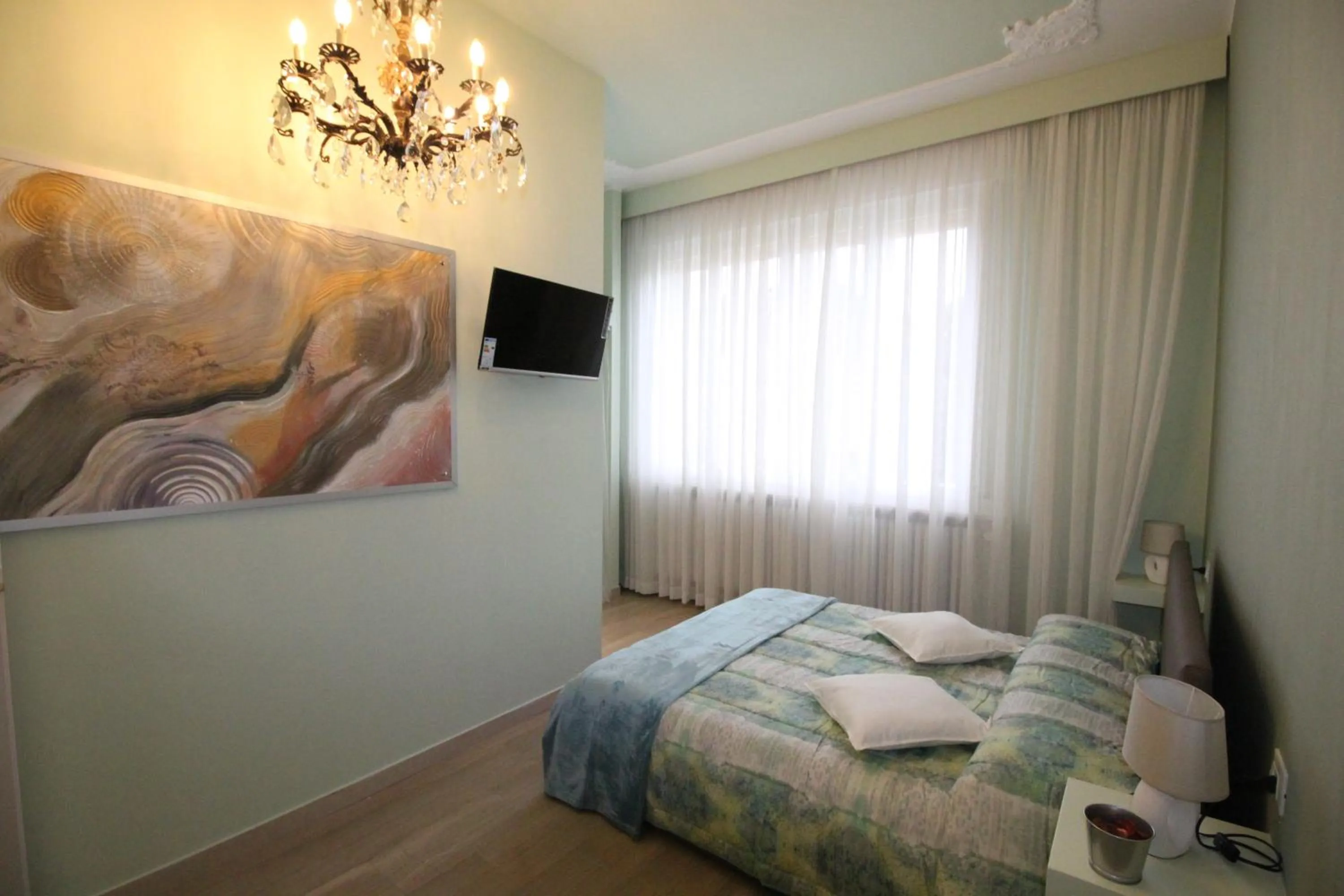 Bed in Ad Astra Rooms