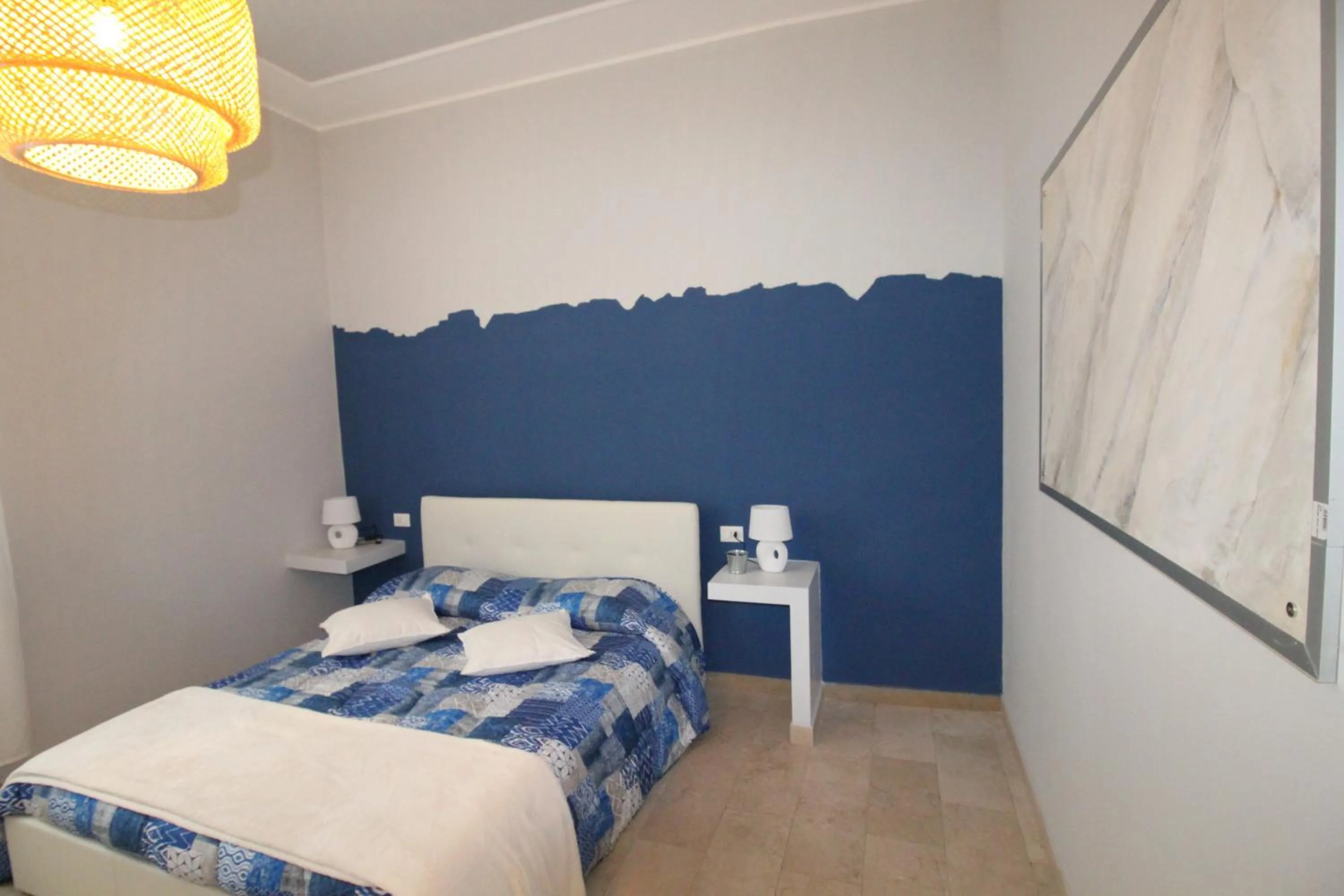 Bed in Ad Astra Rooms