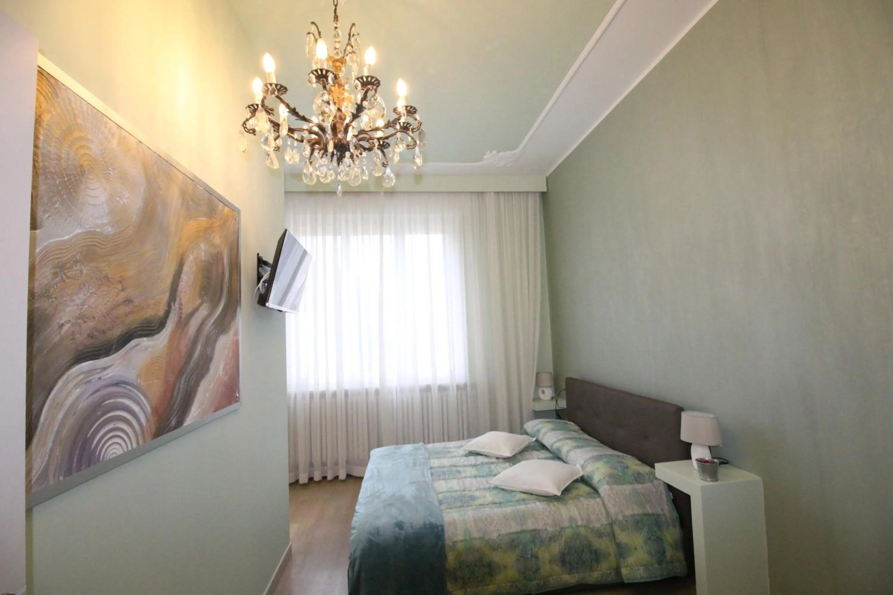 Bed in Ad Astra Rooms