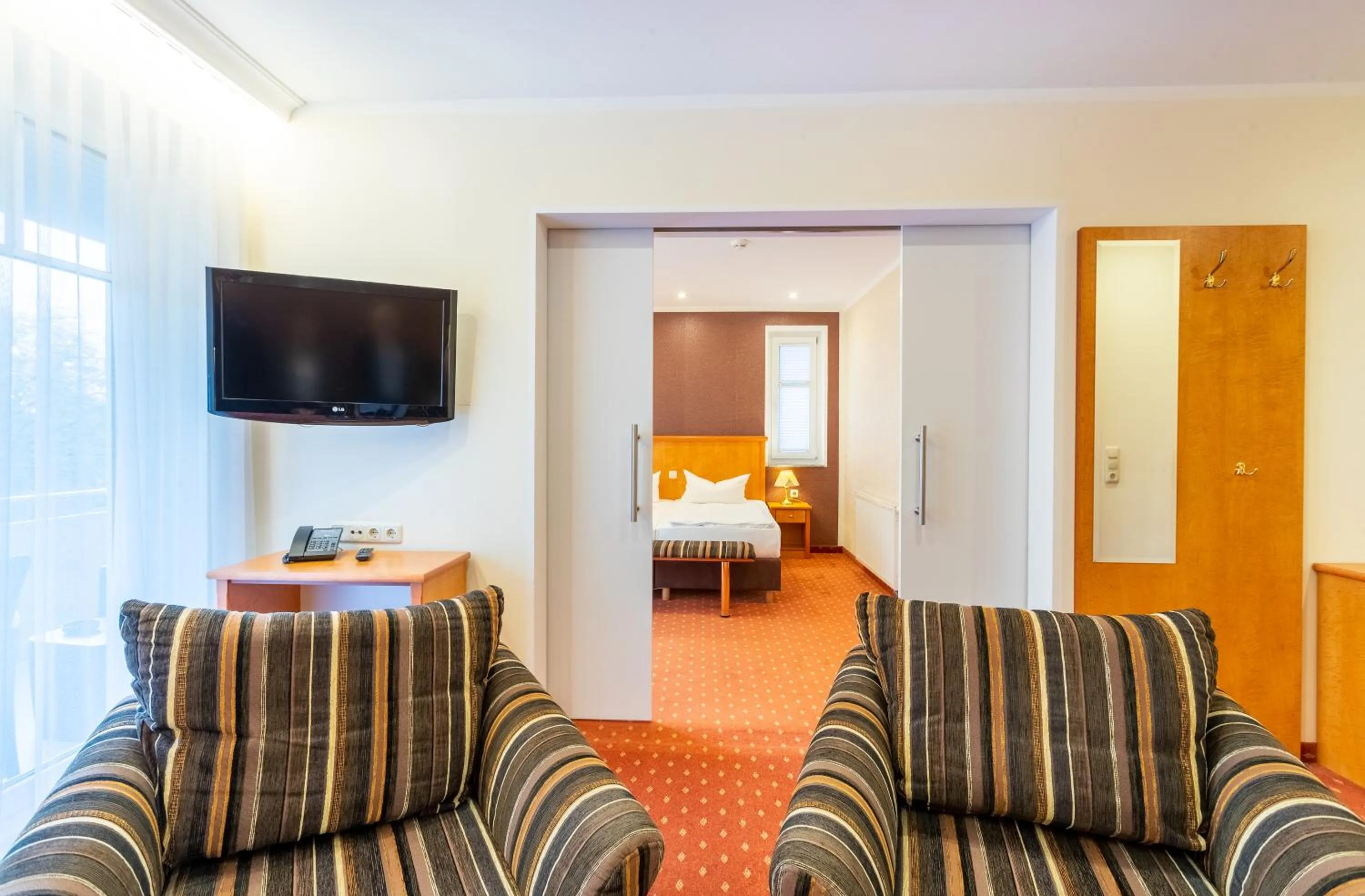 Living room, Bed in Ostseehotel Villen im Park - ein Rovell Hotel