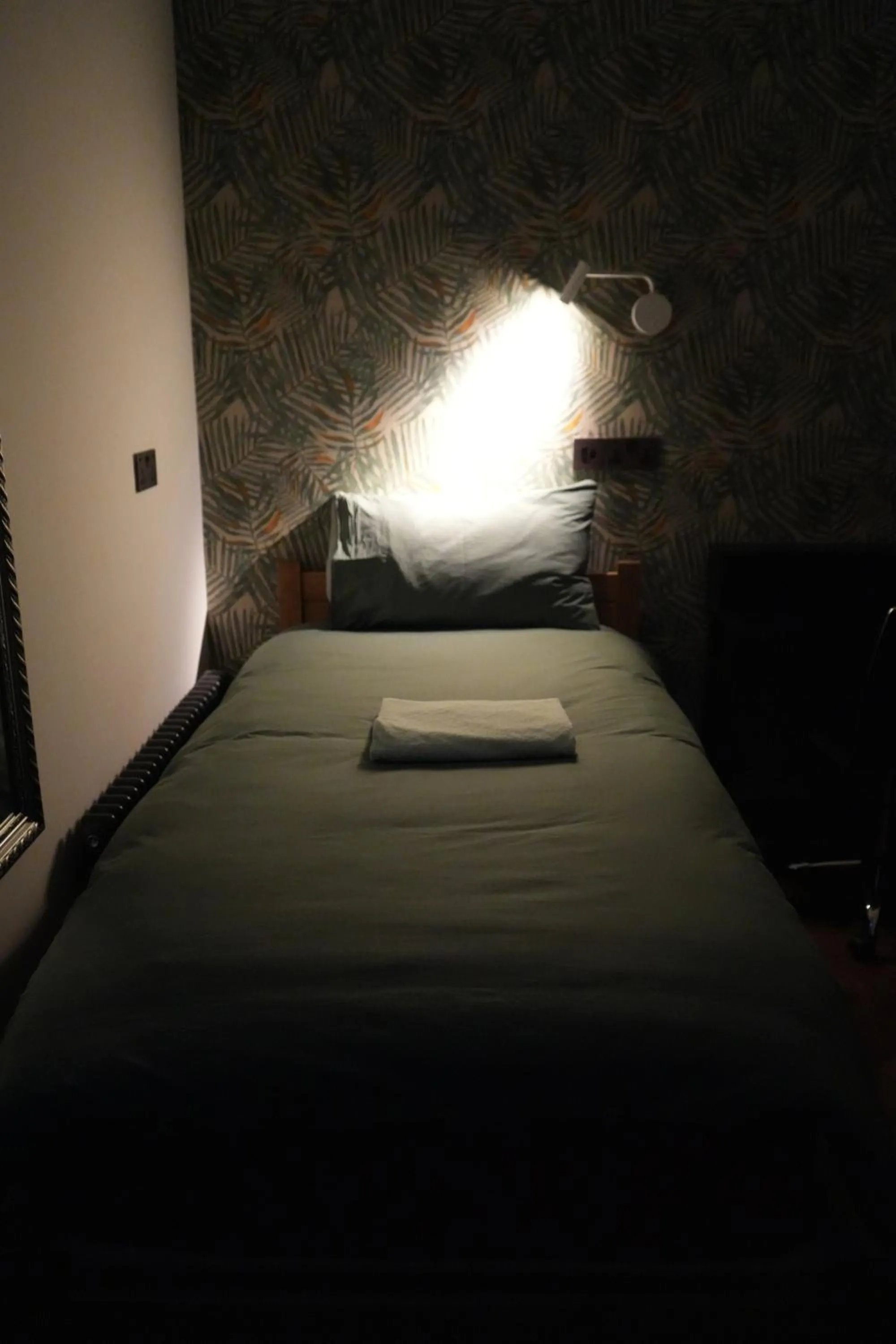 Bed in Fountain Hotel