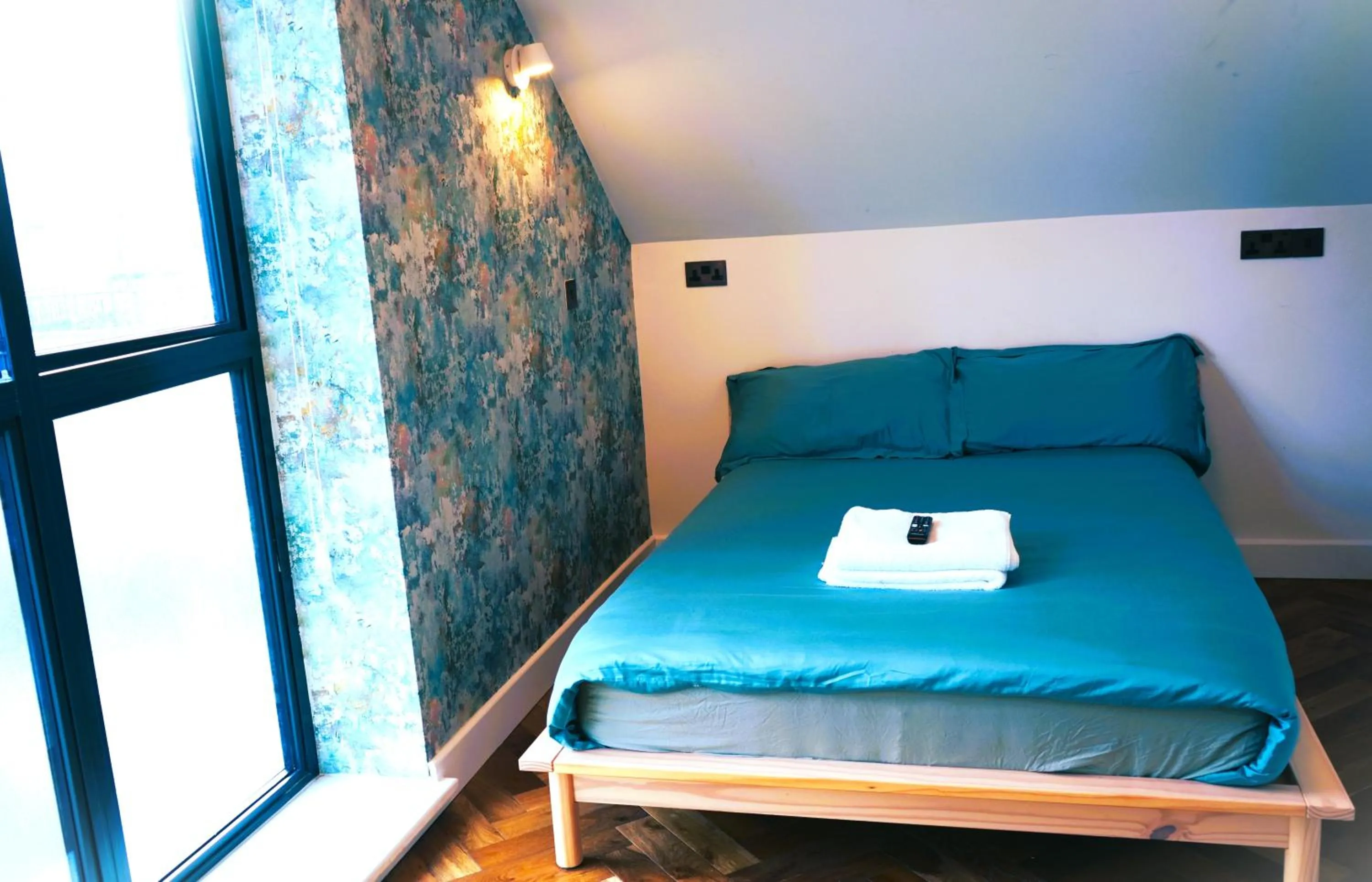 Bed in Fountain Hotel