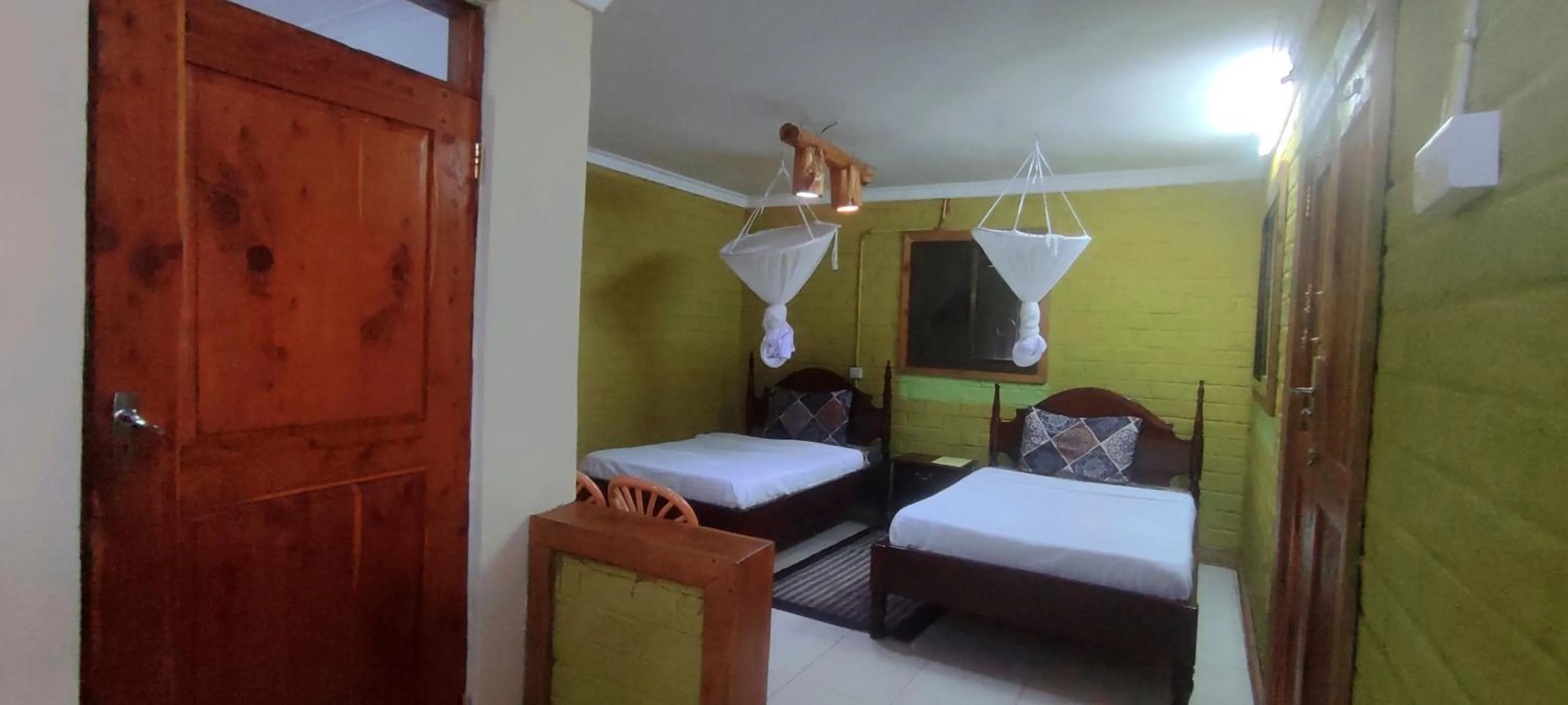 Patio, Bed in LUSHOTO EXECUTIVE LODGE