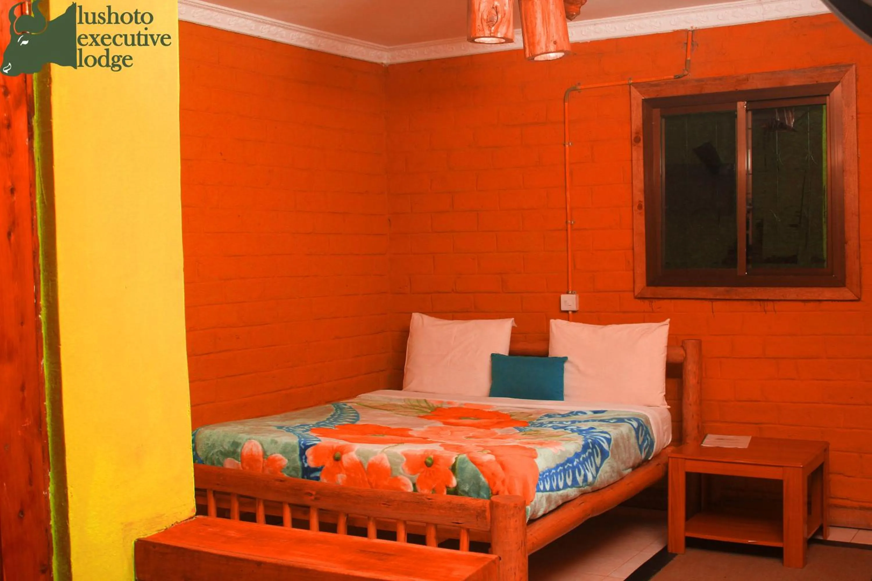 Bed in LUSHOTO EXECUTIVE LODGE