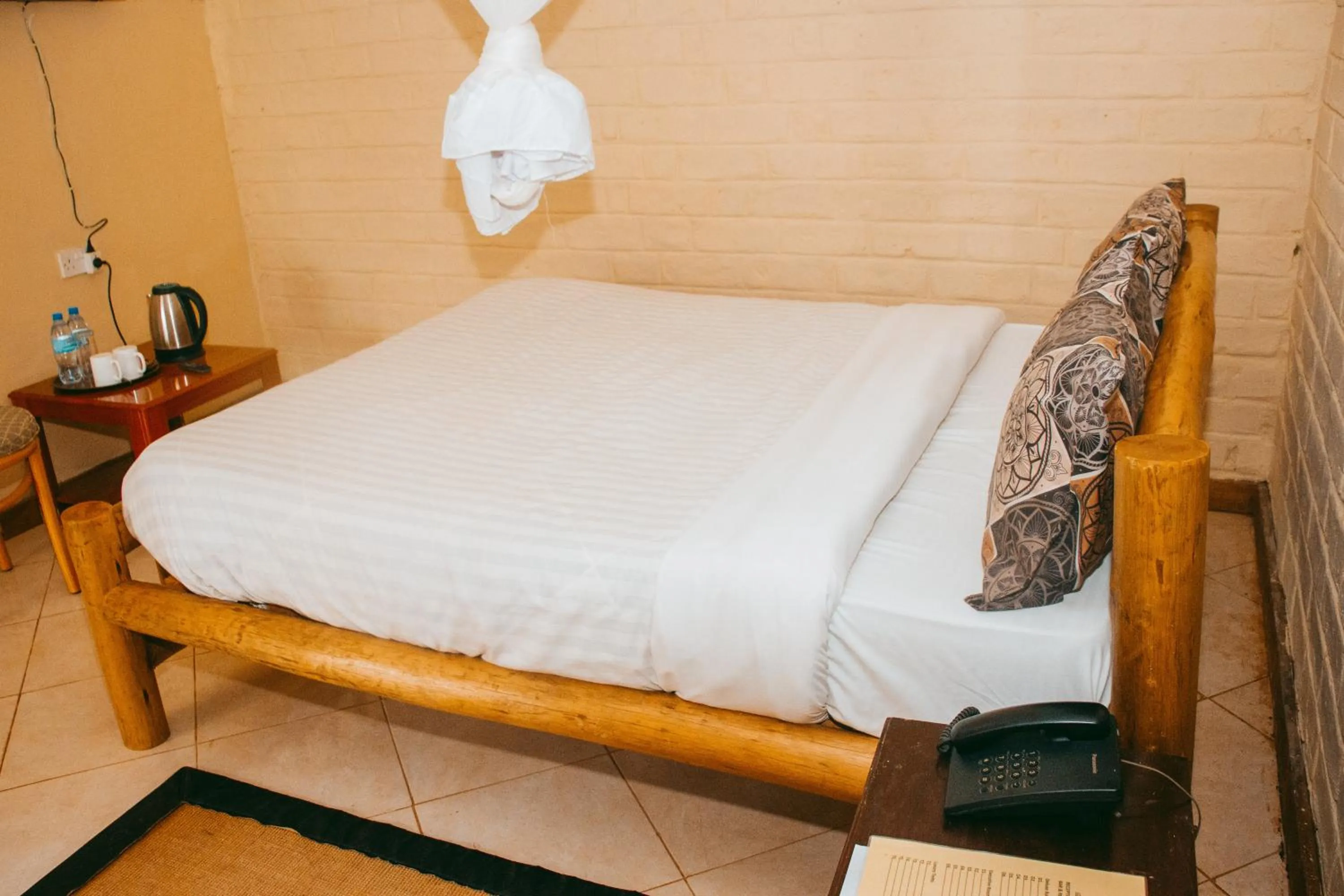 Bed in LUSHOTO EXECUTIVE LODGE