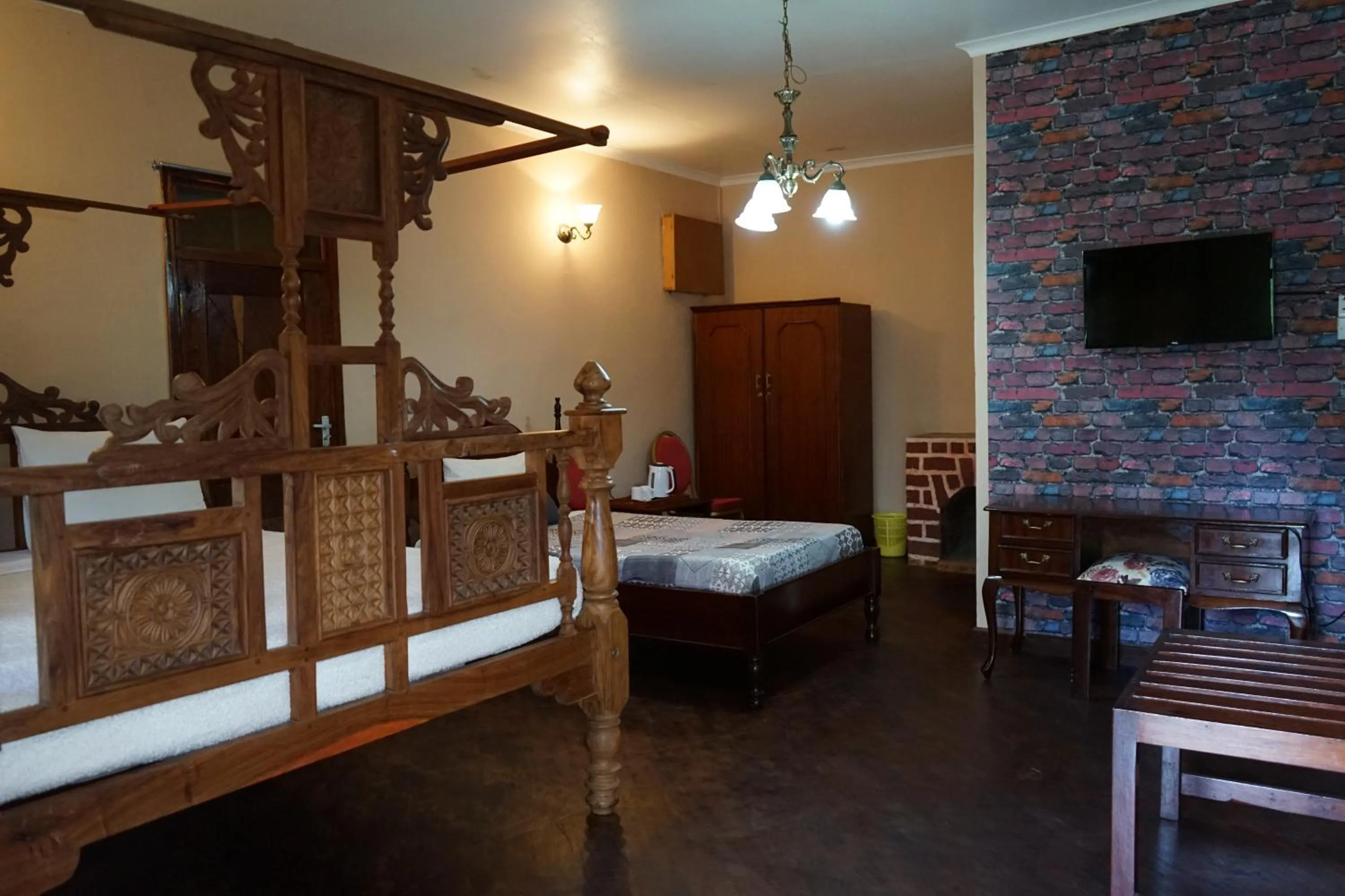 Photo of the whole room, Bed in LUSHOTO EXECUTIVE LODGE