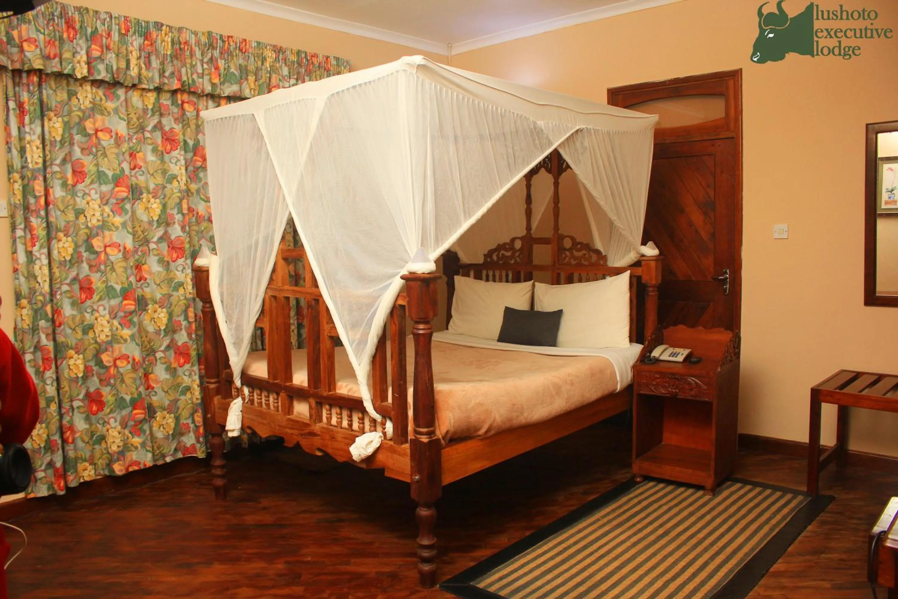 Photo of the whole room, Bed in LUSHOTO EXECUTIVE LODGE