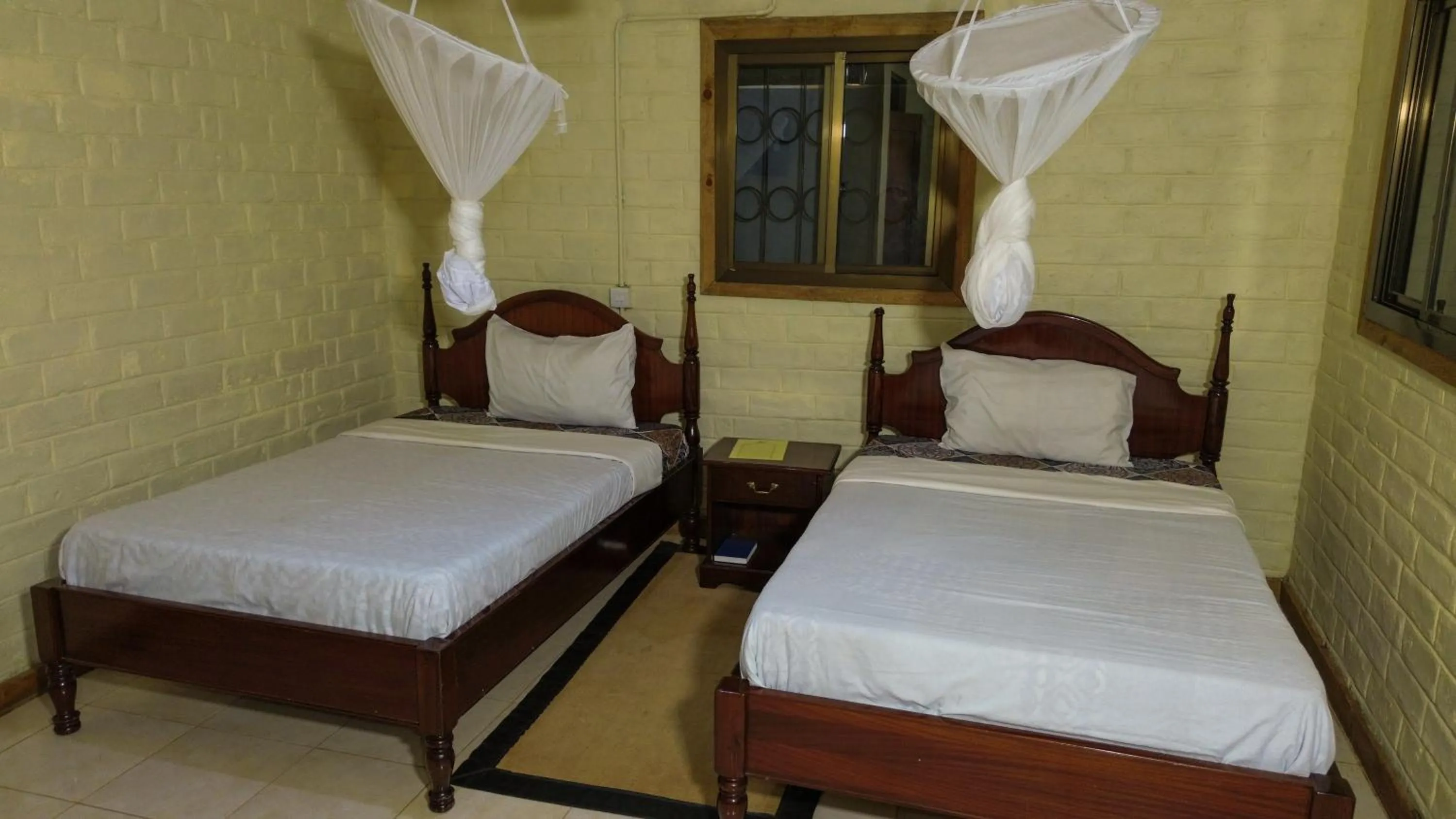Property building, Bed in LUSHOTO EXECUTIVE LODGE