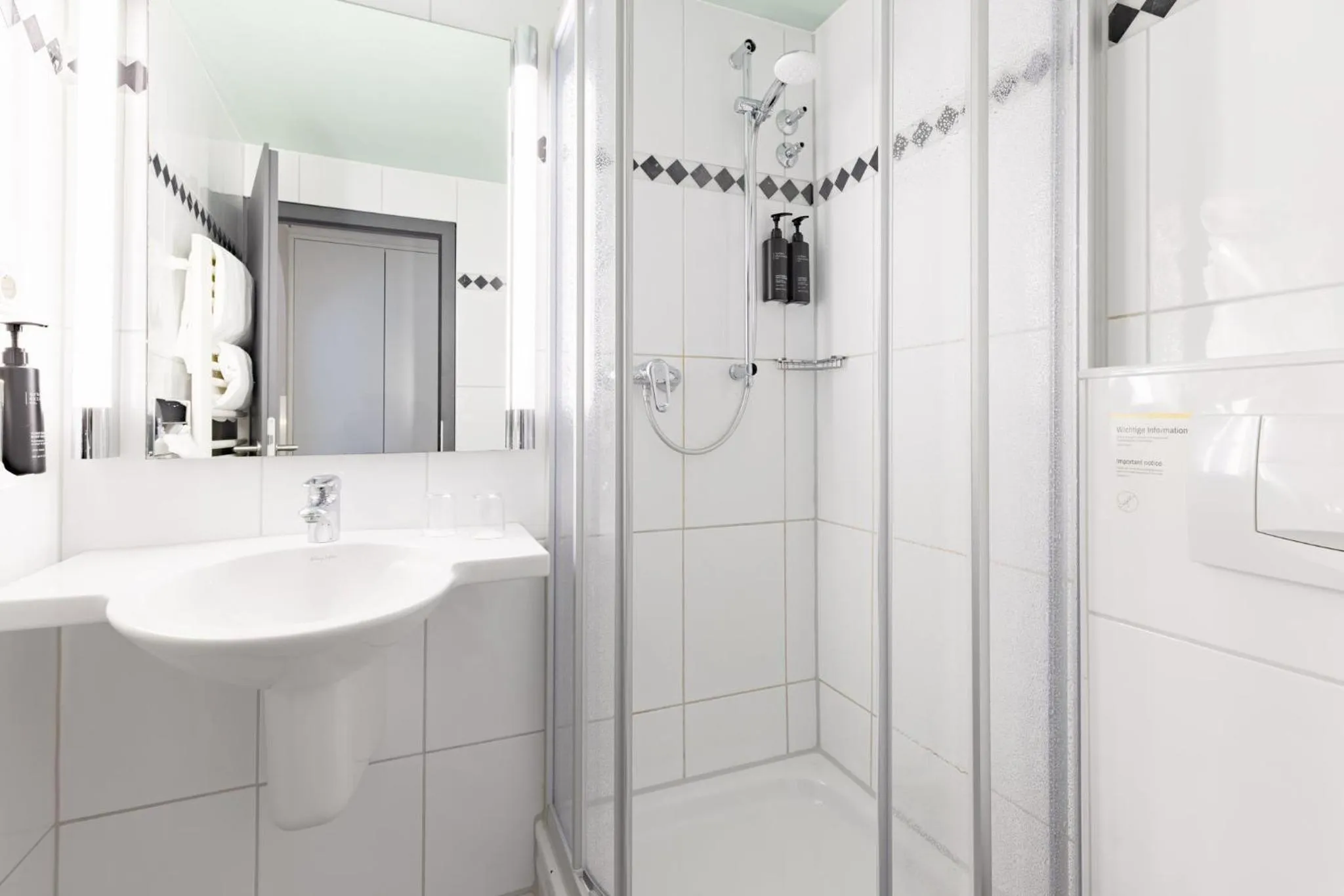 Bathroom in Garner Hotel Cologne East by IHG