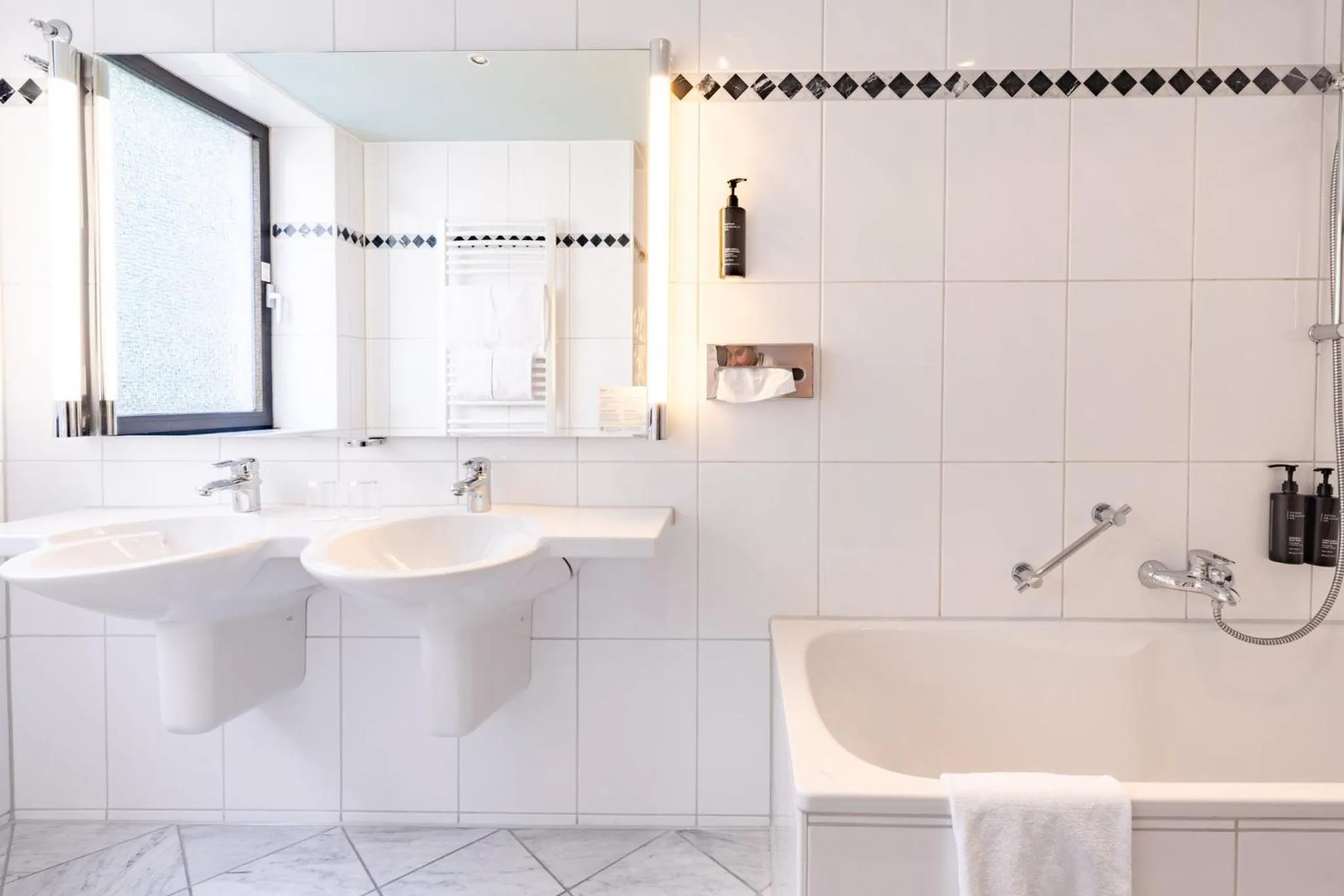 Bathroom in Garner Hotel Cologne East by IHG