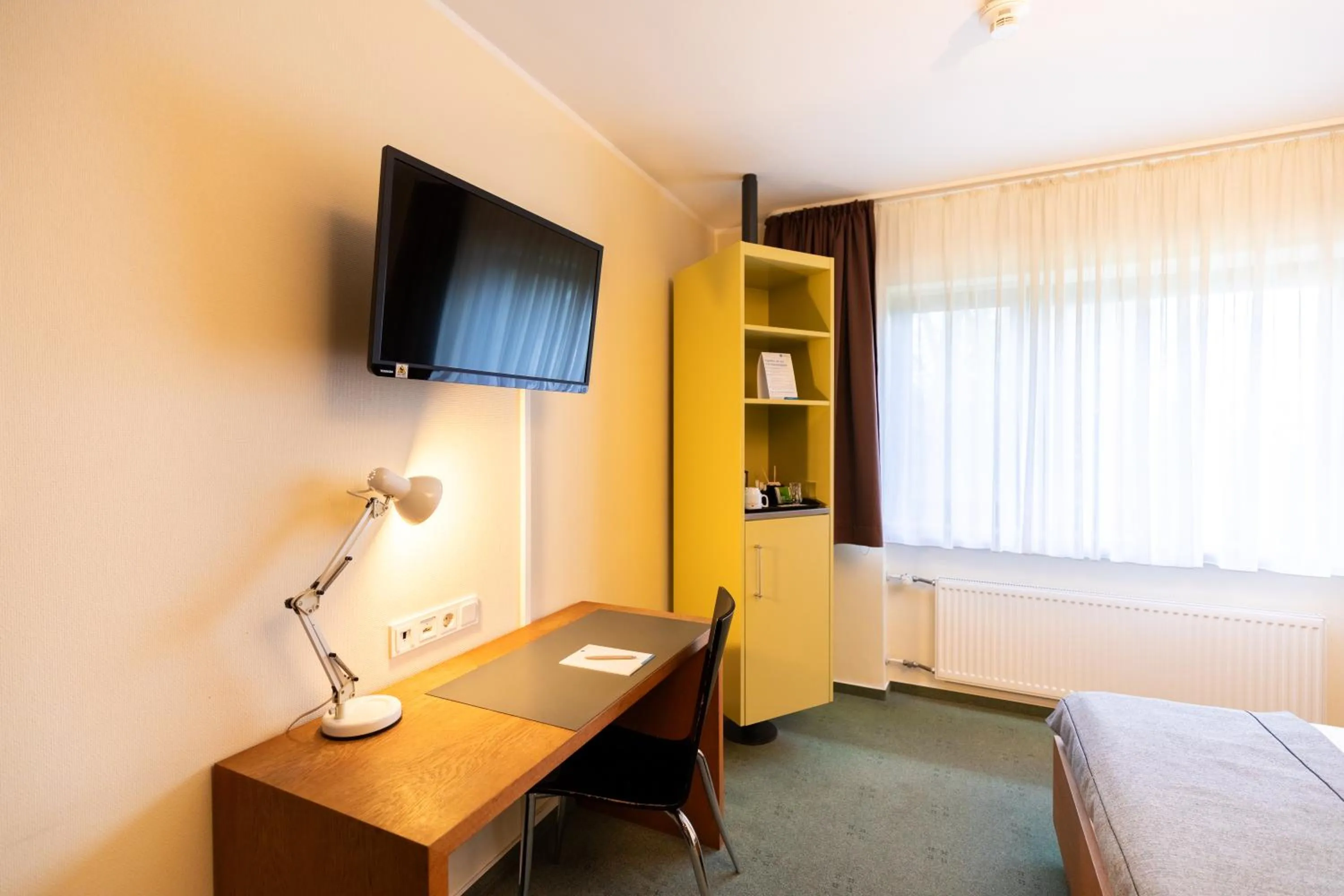 Bed in Select Hotel Silence Garden Köln