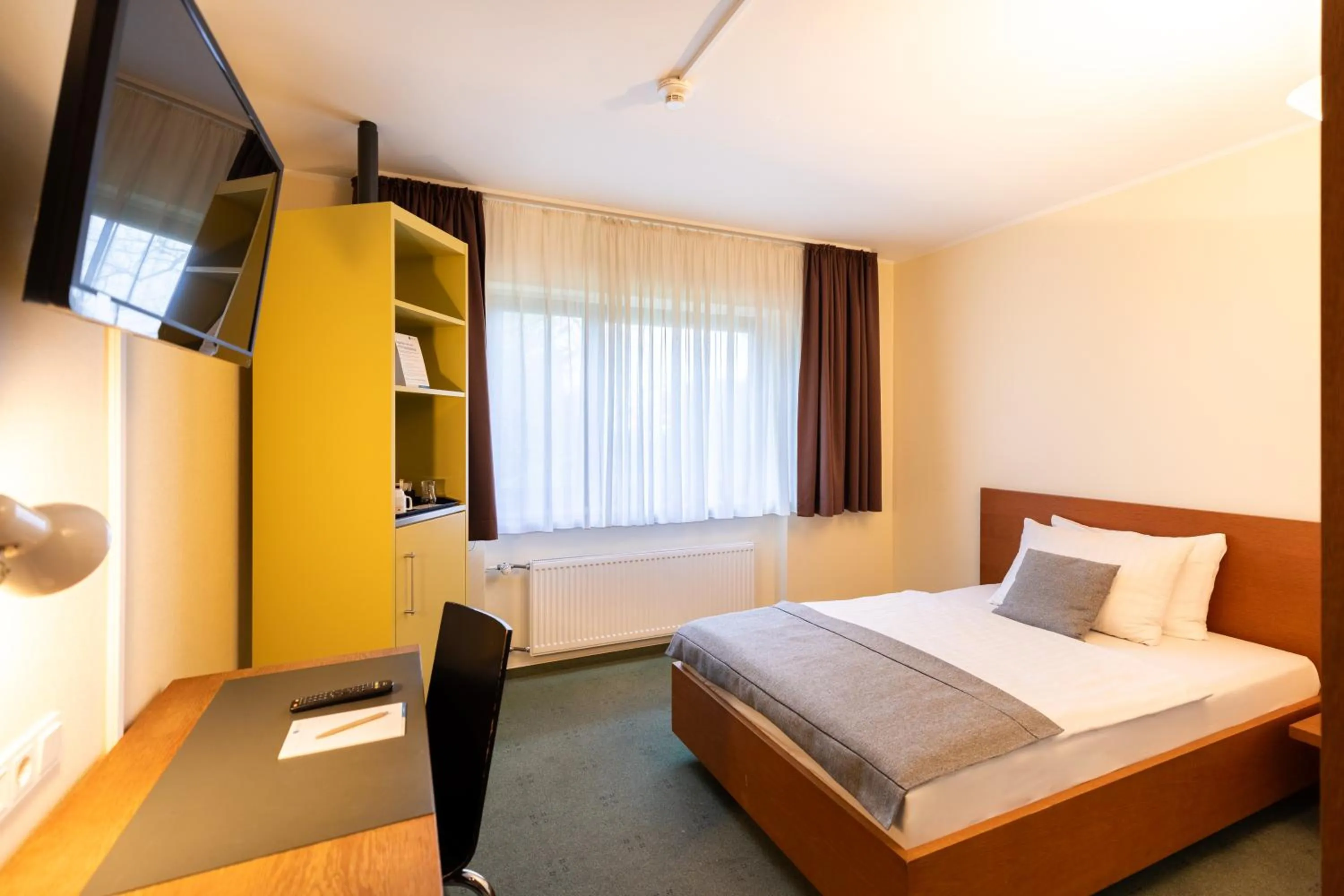 Bed in Select Hotel Silence Garden Köln