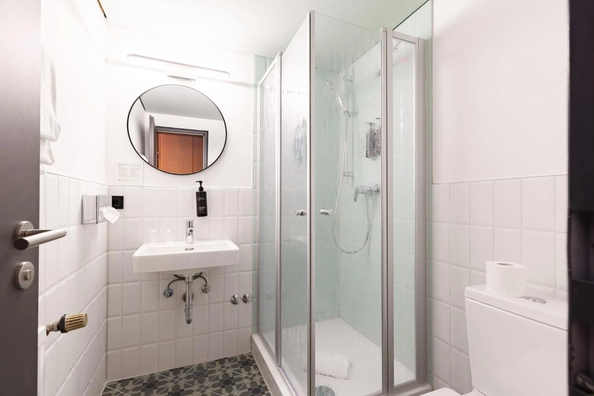 Bathroom in Garner Hotel Cologne East by IHG