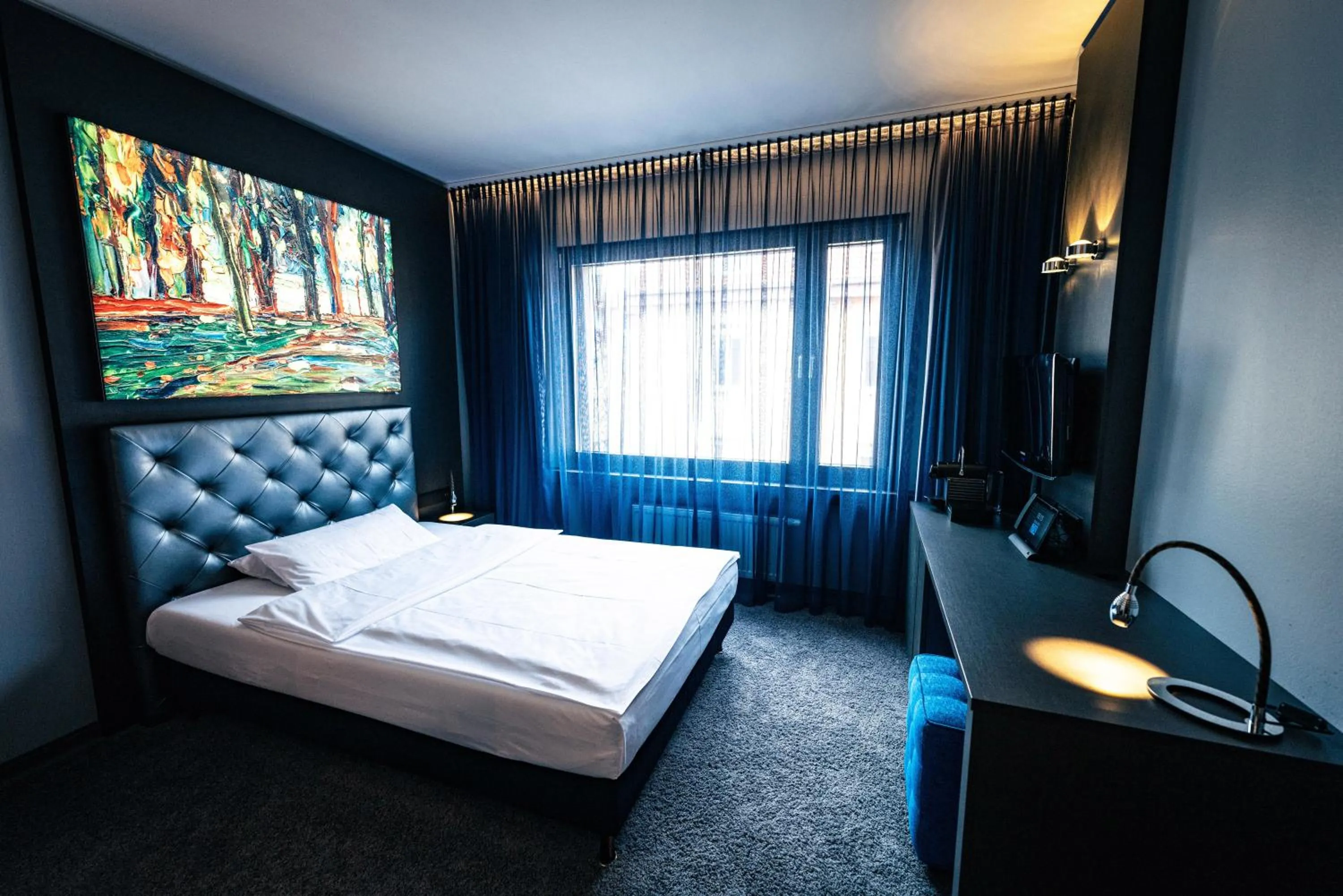 Photo of the whole room, Bed in Hotel Der Blaue Reiter