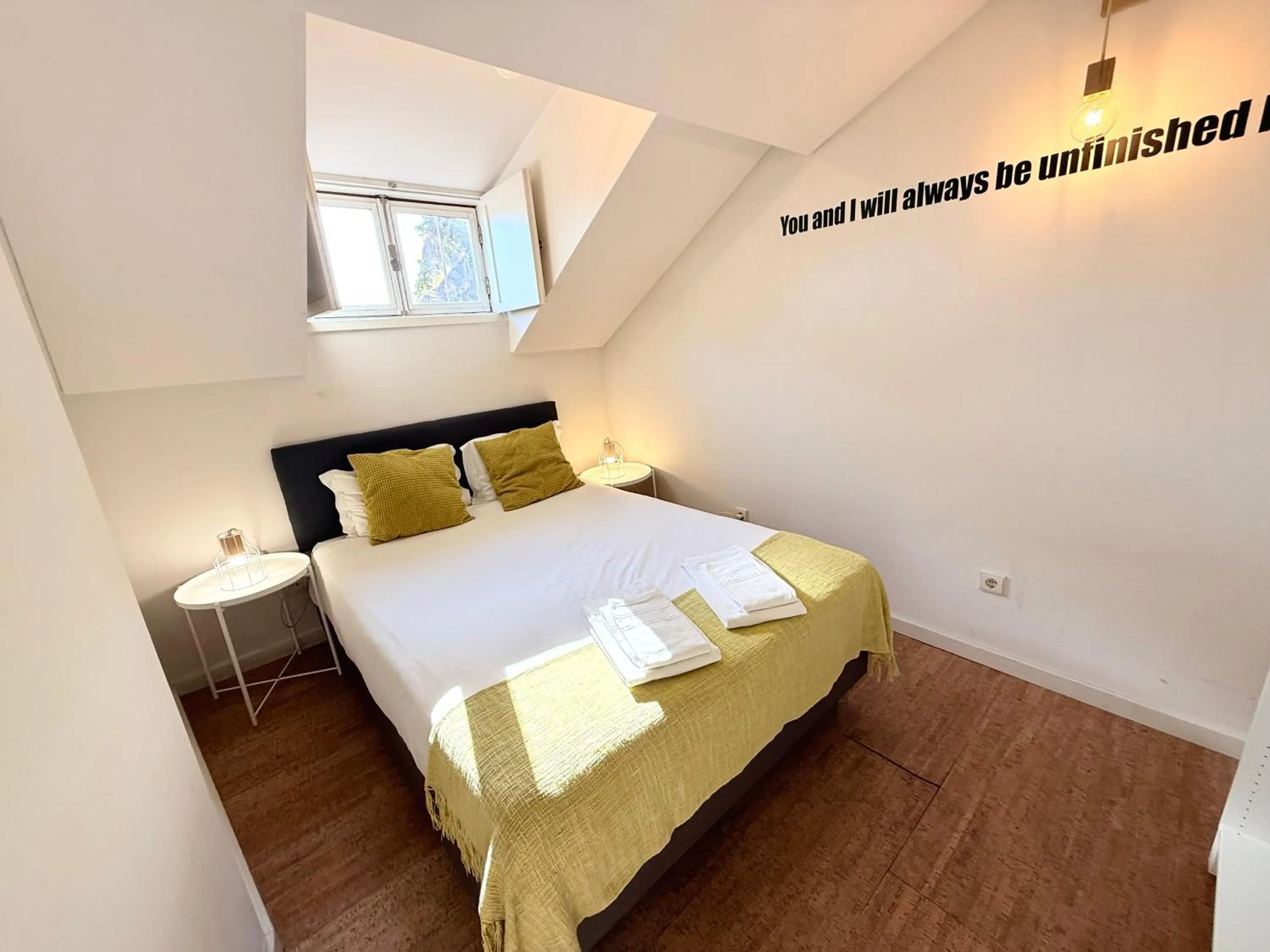 Bed in Ribeira Cinema Apartments