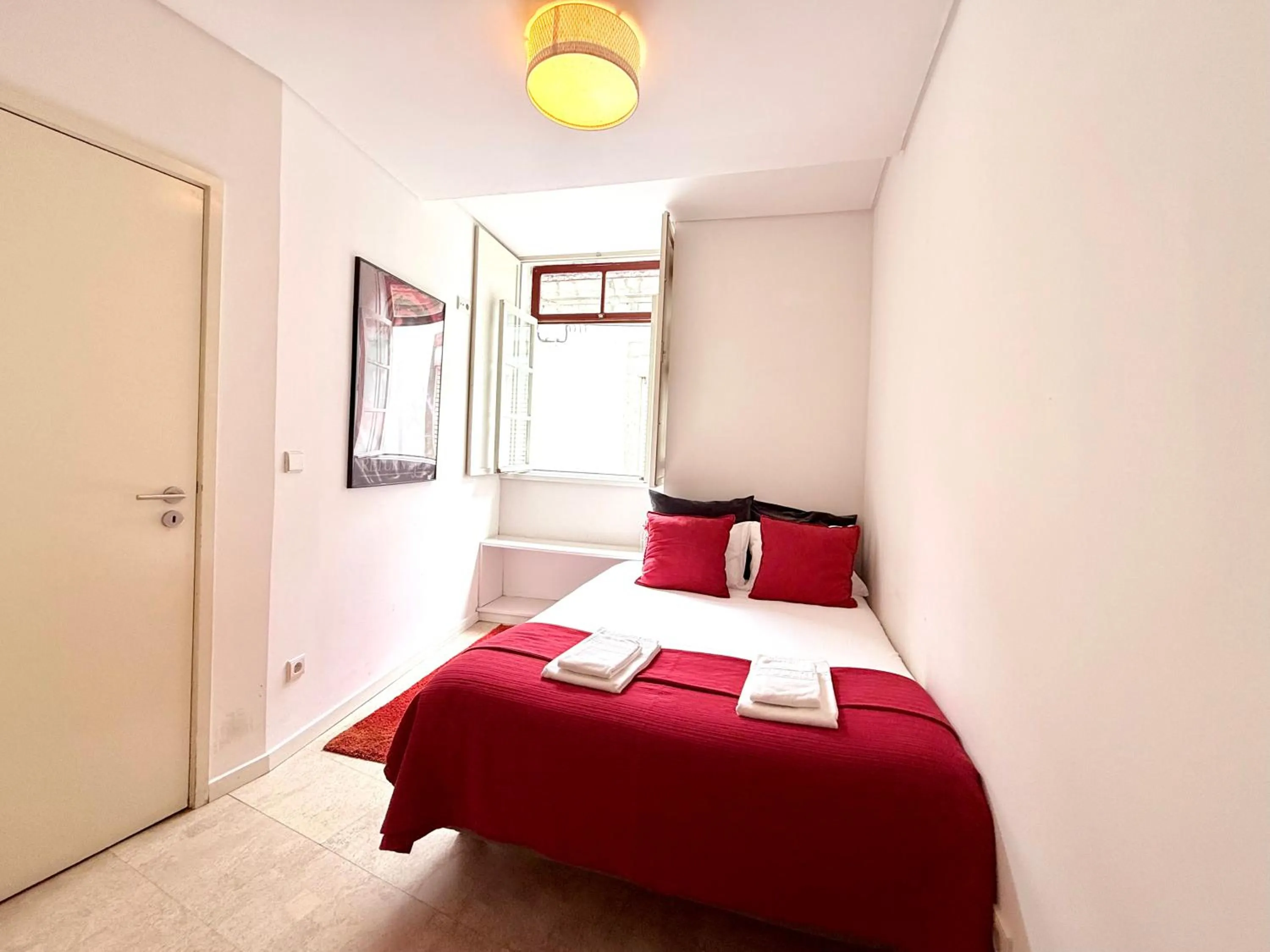 Bed in Ribeira Cinema Apartments