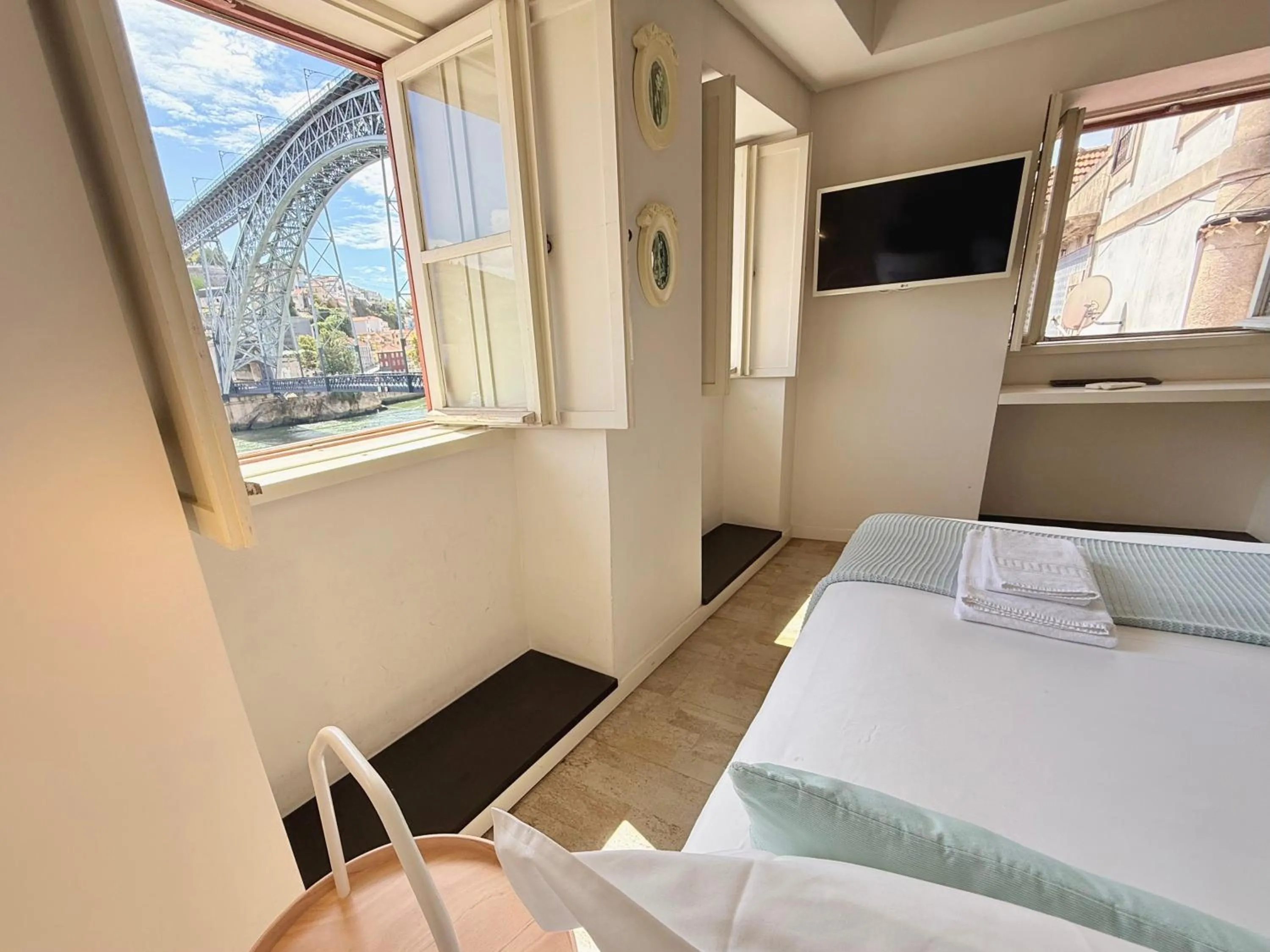 Bed in Ribeira Cinema Apartments